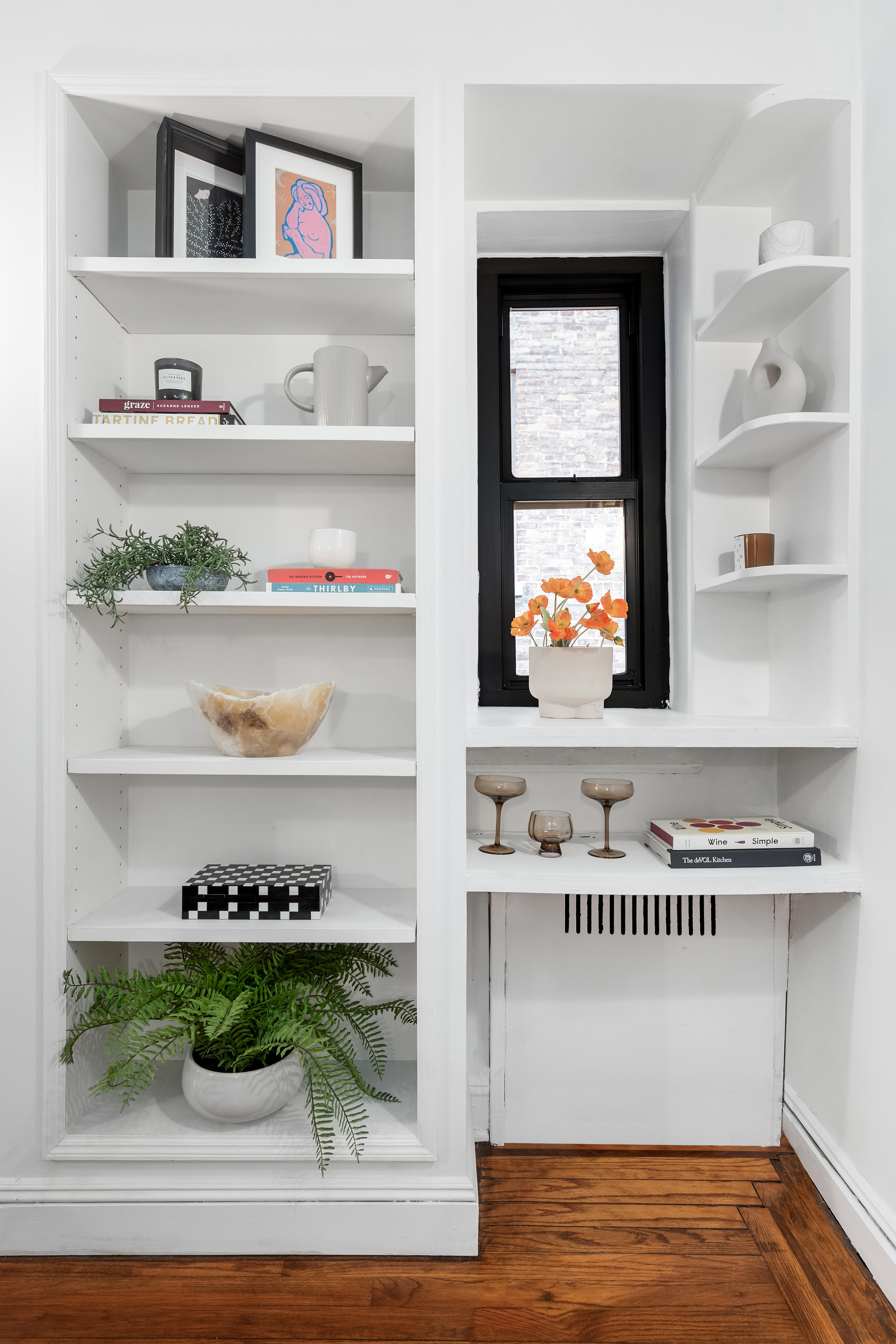 62 East 87th Street, Unit 5AB Manhattan, NY 10128 - Photo 4 of 10 a view of washer and dryer sitting in a kitchen