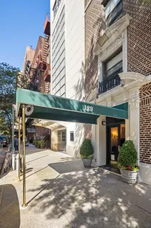 a view of a building with a street view