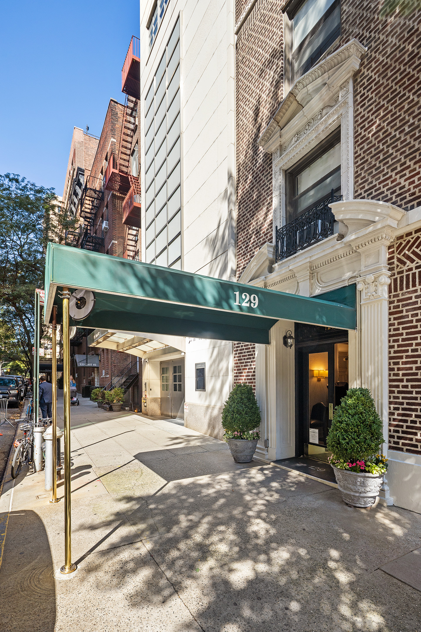 129 East 82nd Street, Unit 1C Manhattan, NY 10028 - Photo 11 of 13 a view of a building with a street view