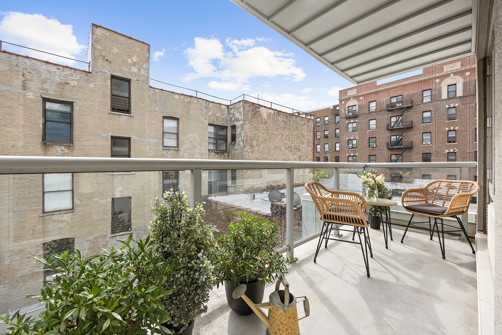 823 Classon Avenue, Unit 4B Brooklyn, NY 11238 - Photo 4 of 17 a balcony with table and chairs