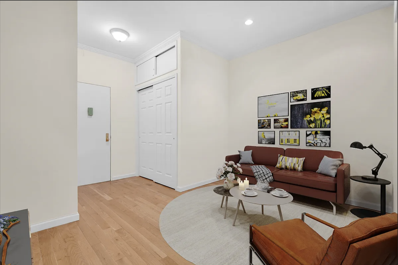 370 Columbus Avenue, Unit 2C Manhattan, NY 10024 - Photo 2 of 10 a living room with furniture and a wooden floor