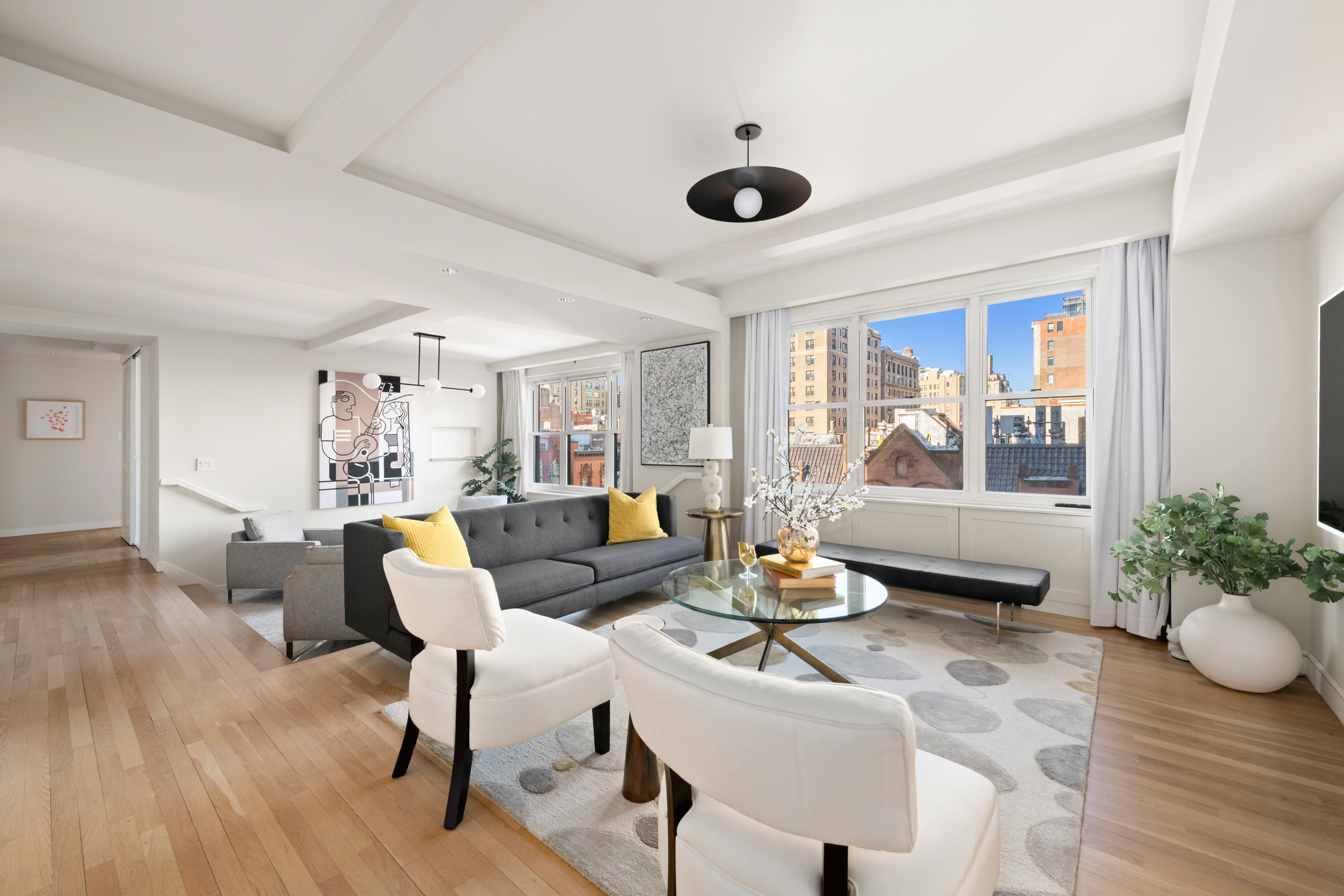 336 West End Avenue, Unit 7CD Manhattan, NY 10023 - Photo 1 of 16 a living room with furniture and wooden floor