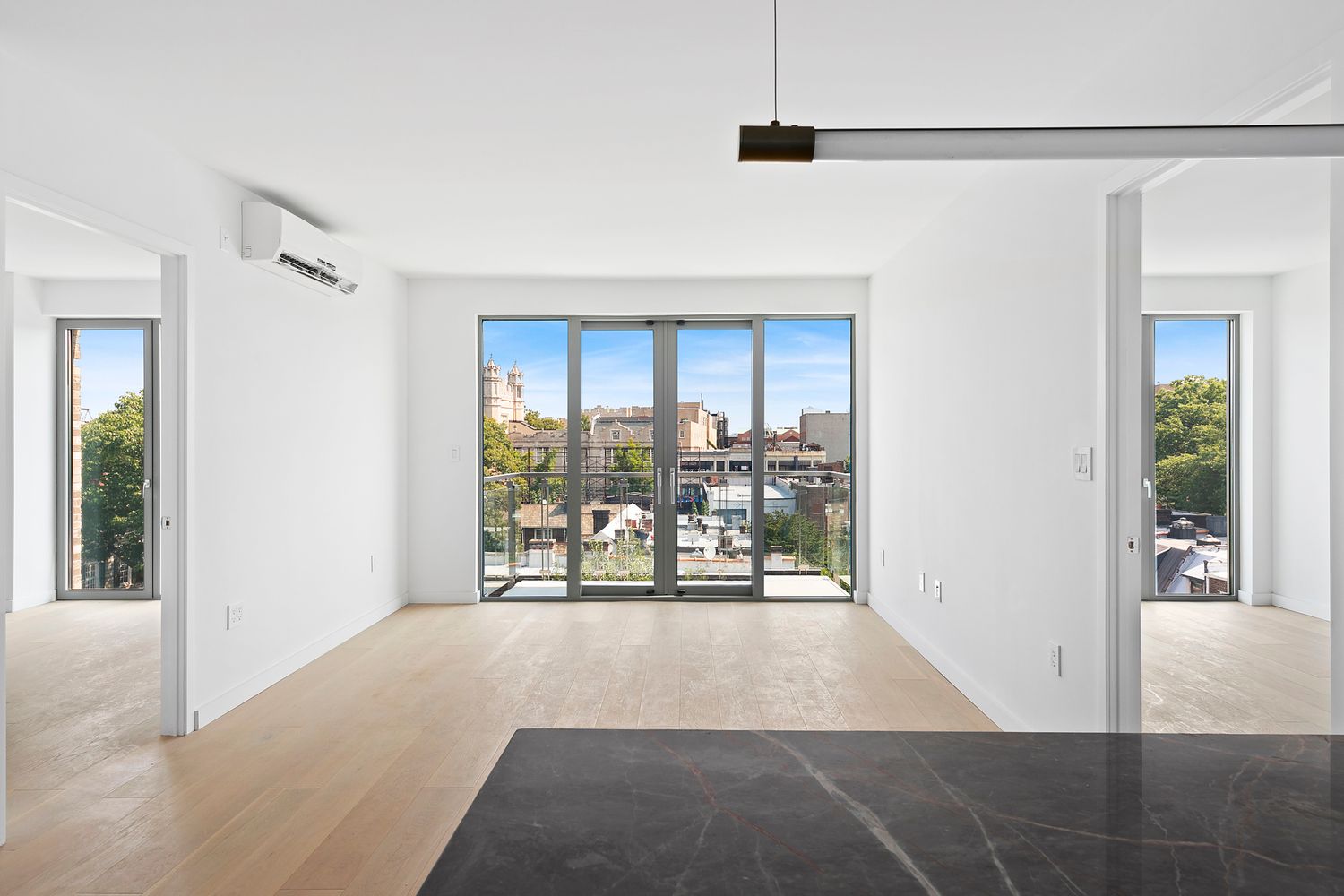 567 Ocean Avenue, Unit B504 Brooklyn, NY 11226 - Photo 1 of 8 a room with a large window