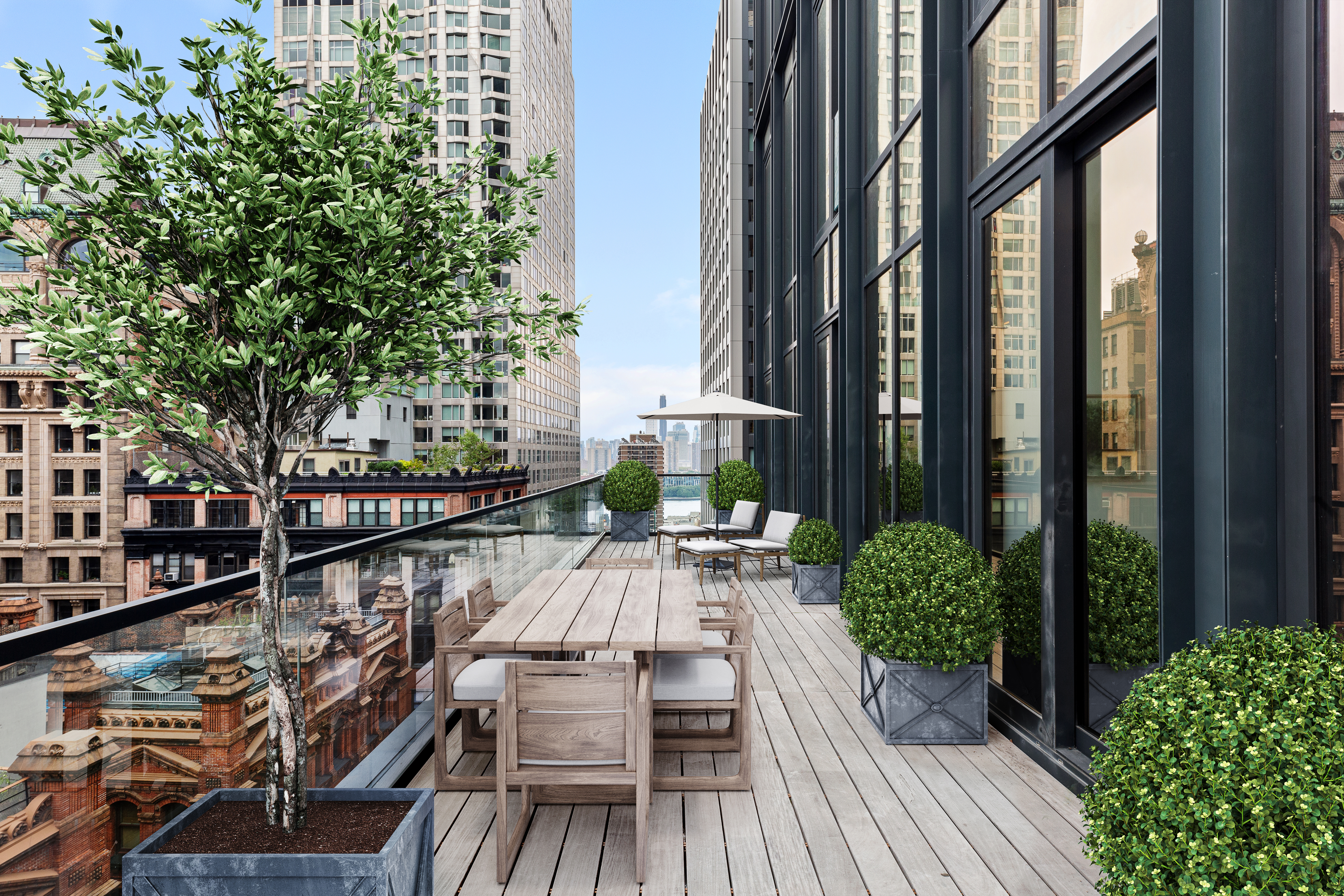 a balcony with wooden floor and outdoor seating