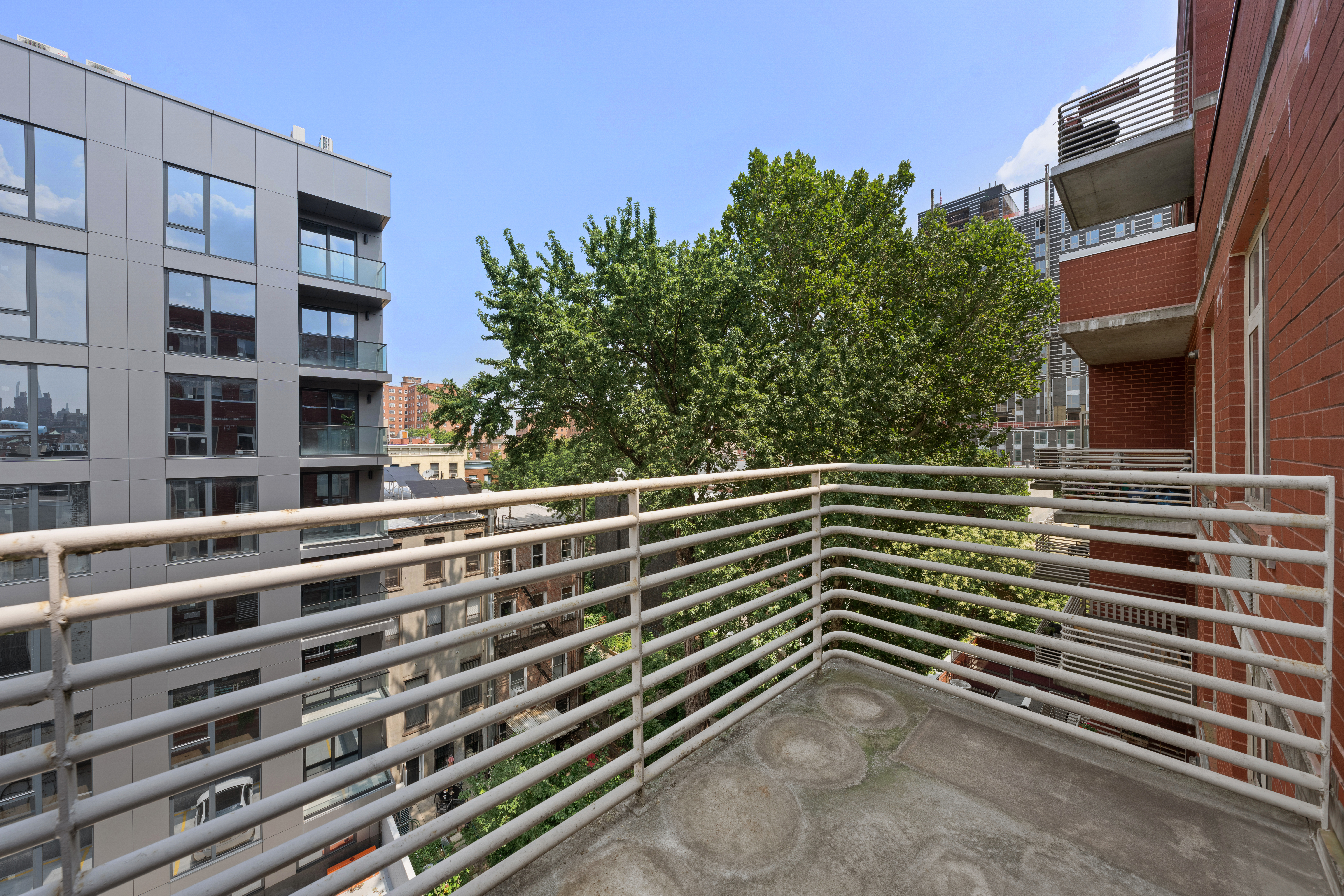 161 East 110th Street, Unit 6A Manhattan, NY 10029 - Photo 9 of 10 a view of building with window