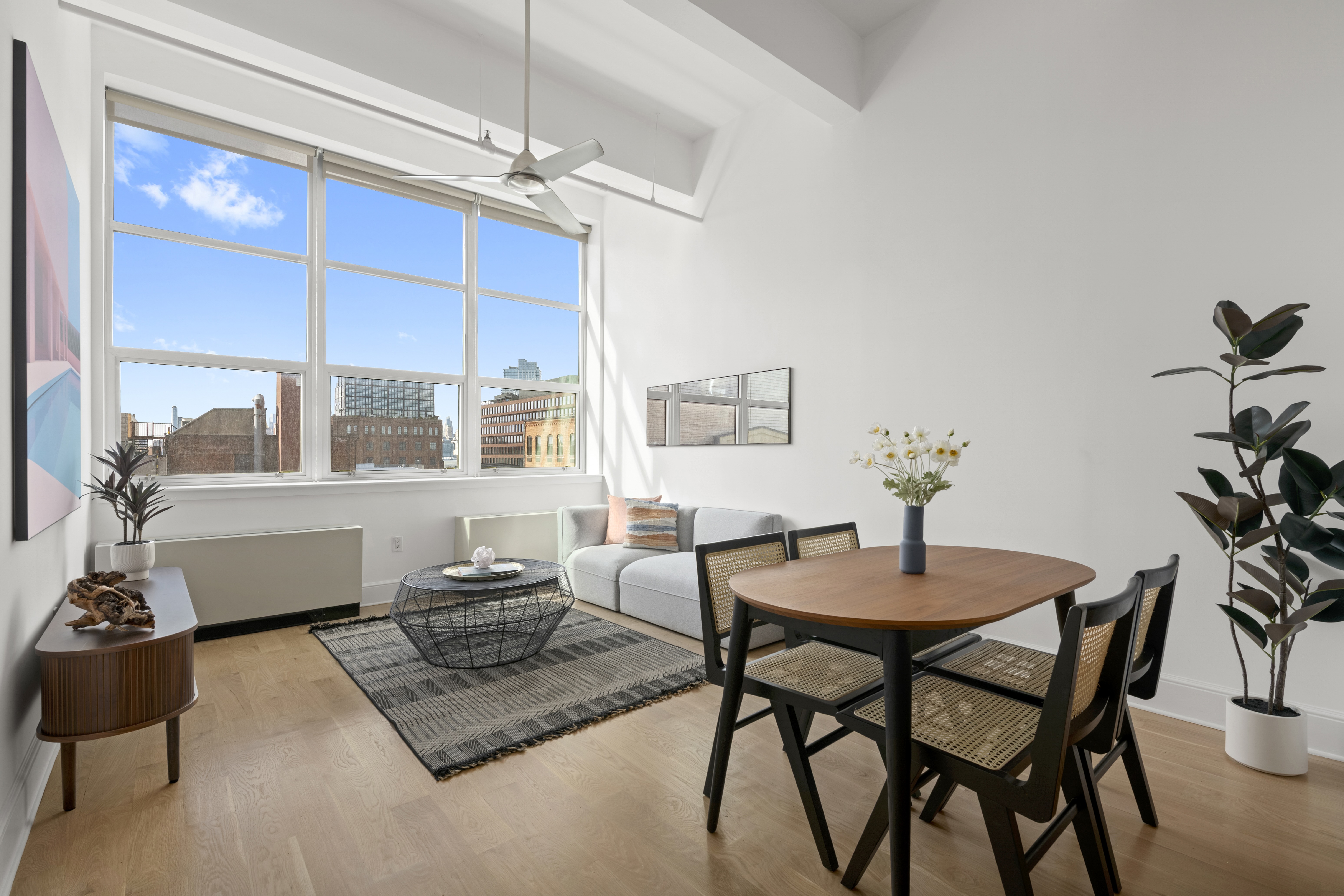 55 Berry Street, Unit 4B Brooklyn, NY 11249 - Photo 2 of 12 a dining room with furniture and window