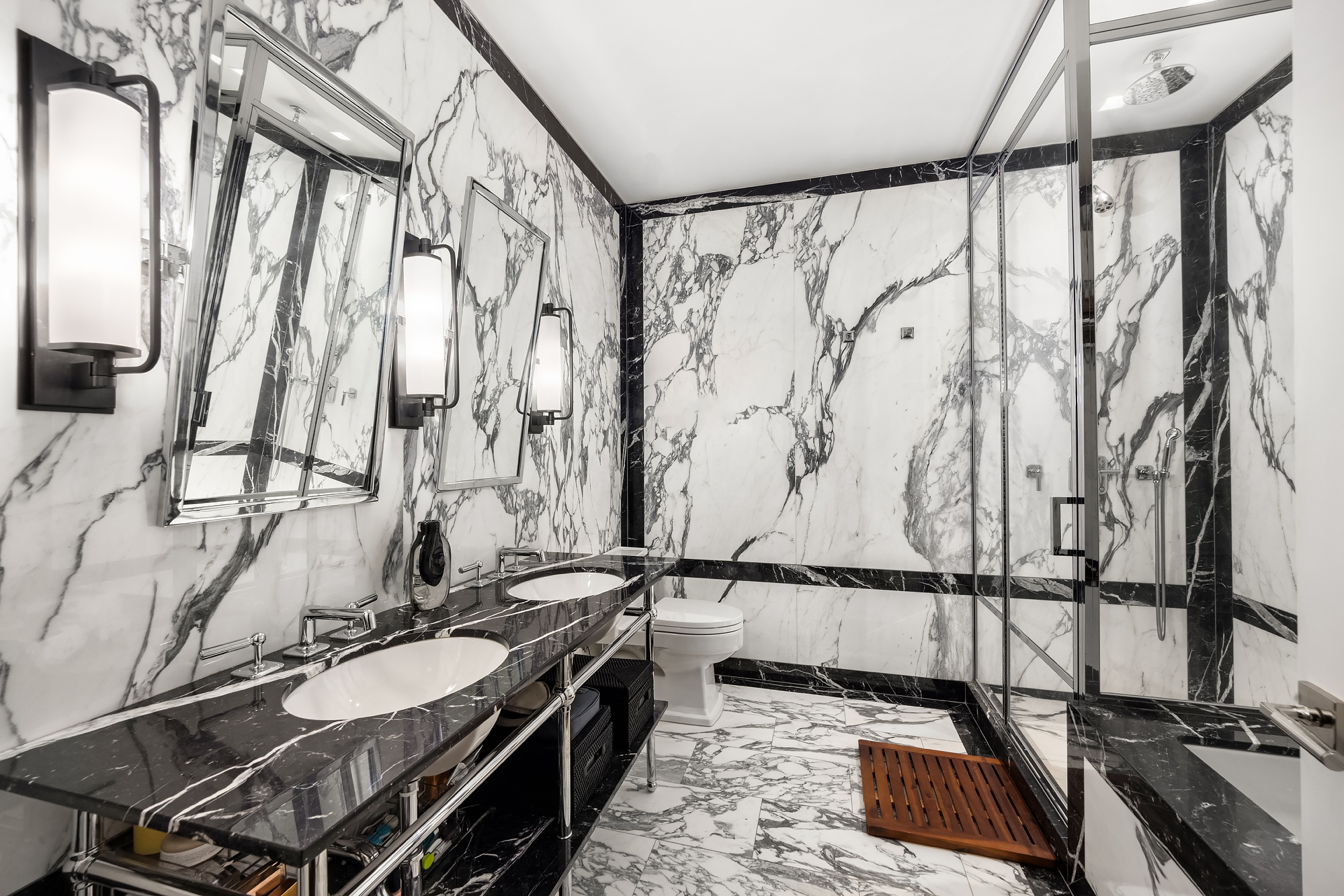 14-16 Wooster Street, Unit 2 Manhattan, NY 10013 - Photo 19 of 22 a bathroom with a sink and a mirror