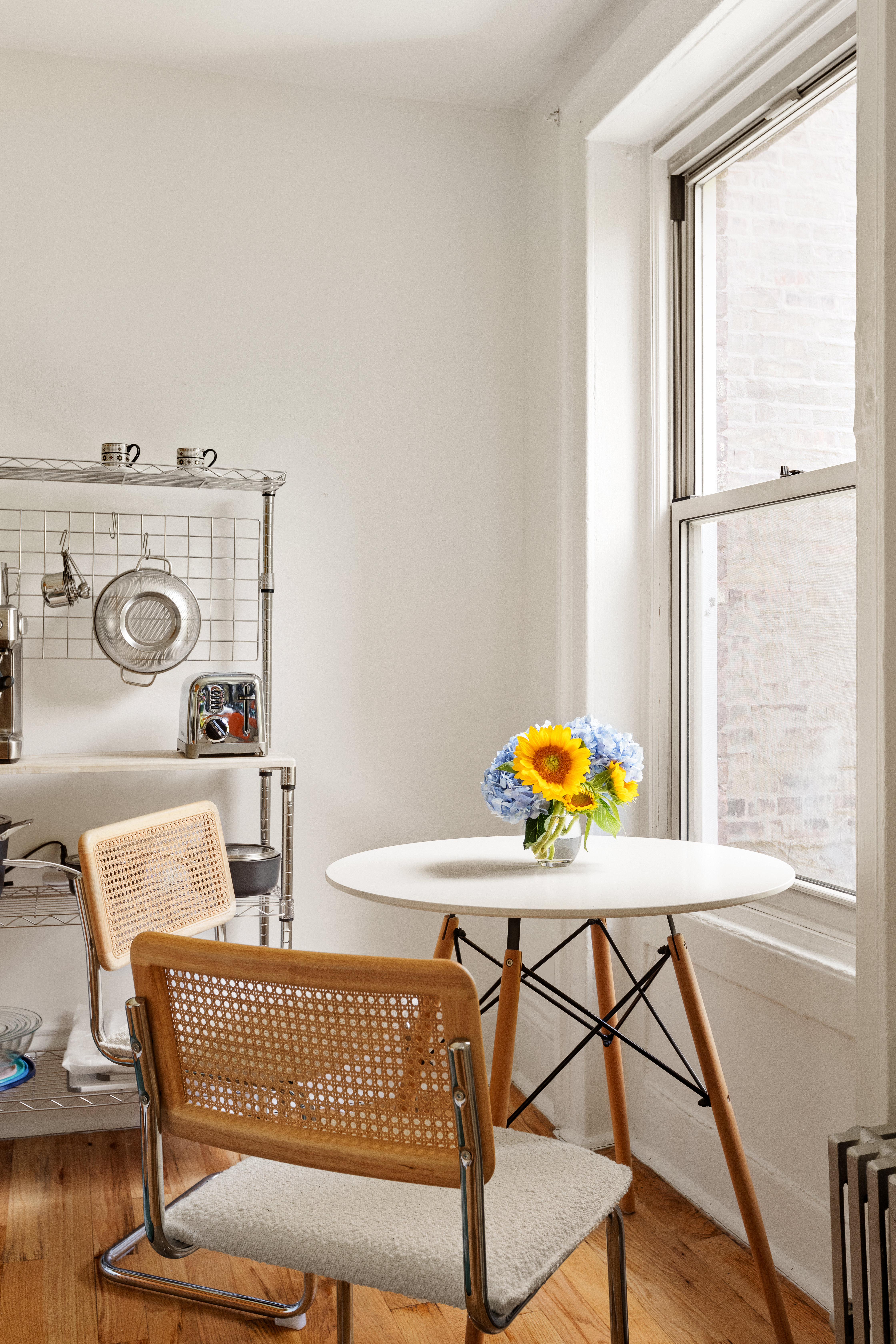 311 East 9th Street, Unit 2R Manhattan, NY 10003 - Photo 2 of 5 a view of a dining room with furniture and window