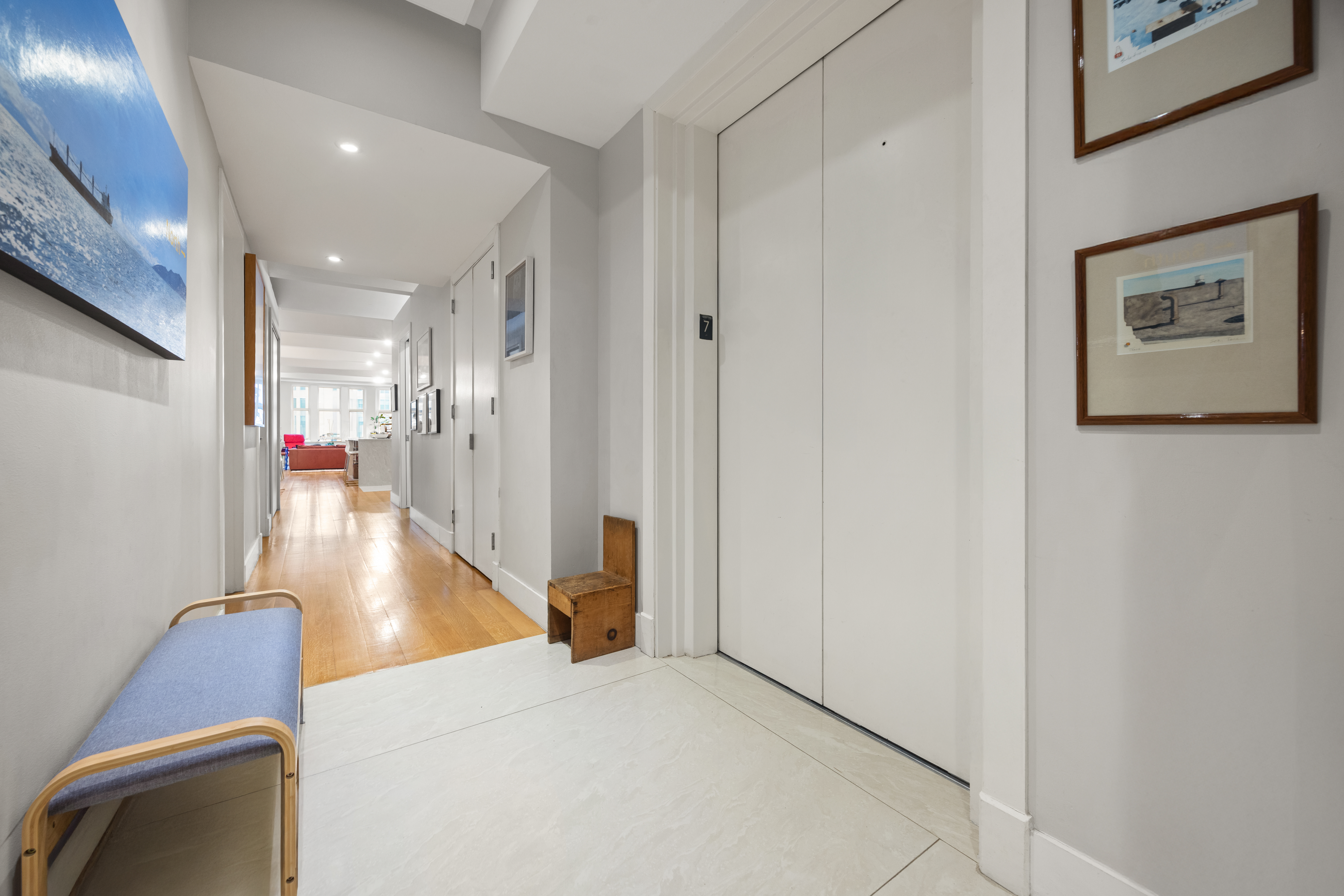 42 Ann Street, Unit 5 Manhattan, NY 10038 - Photo 9 of 16 a view of a hallway with wooden floor