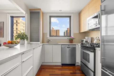 a kitchen with a stove and a sink