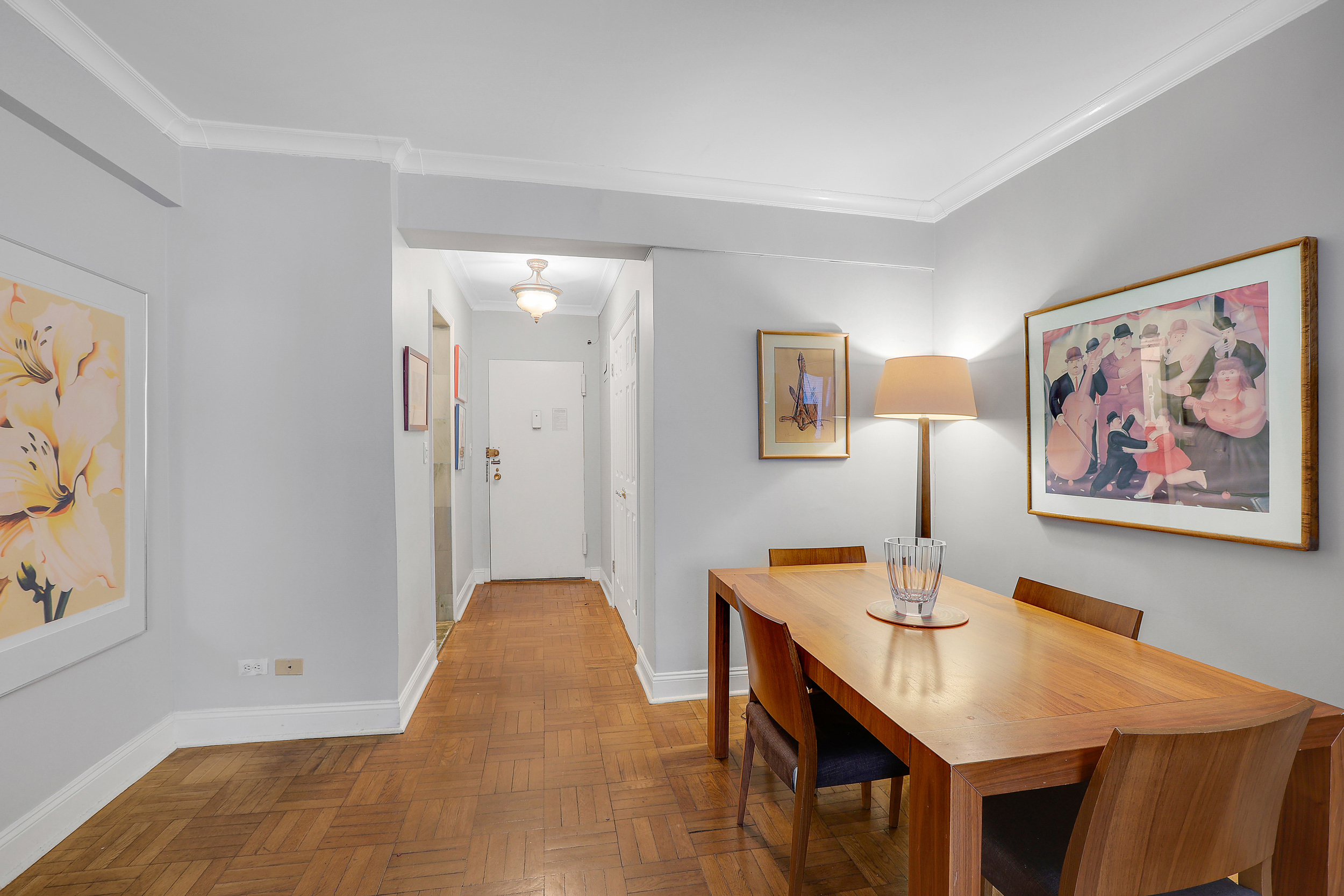 100 West 57th Street, Unit 15N Manhattan, NY 10019 - Photo 3 of 9 a view of a livingroom with furniture and window