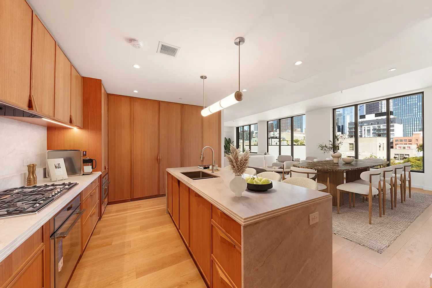 a kitchen that has a lot of cabinets in it