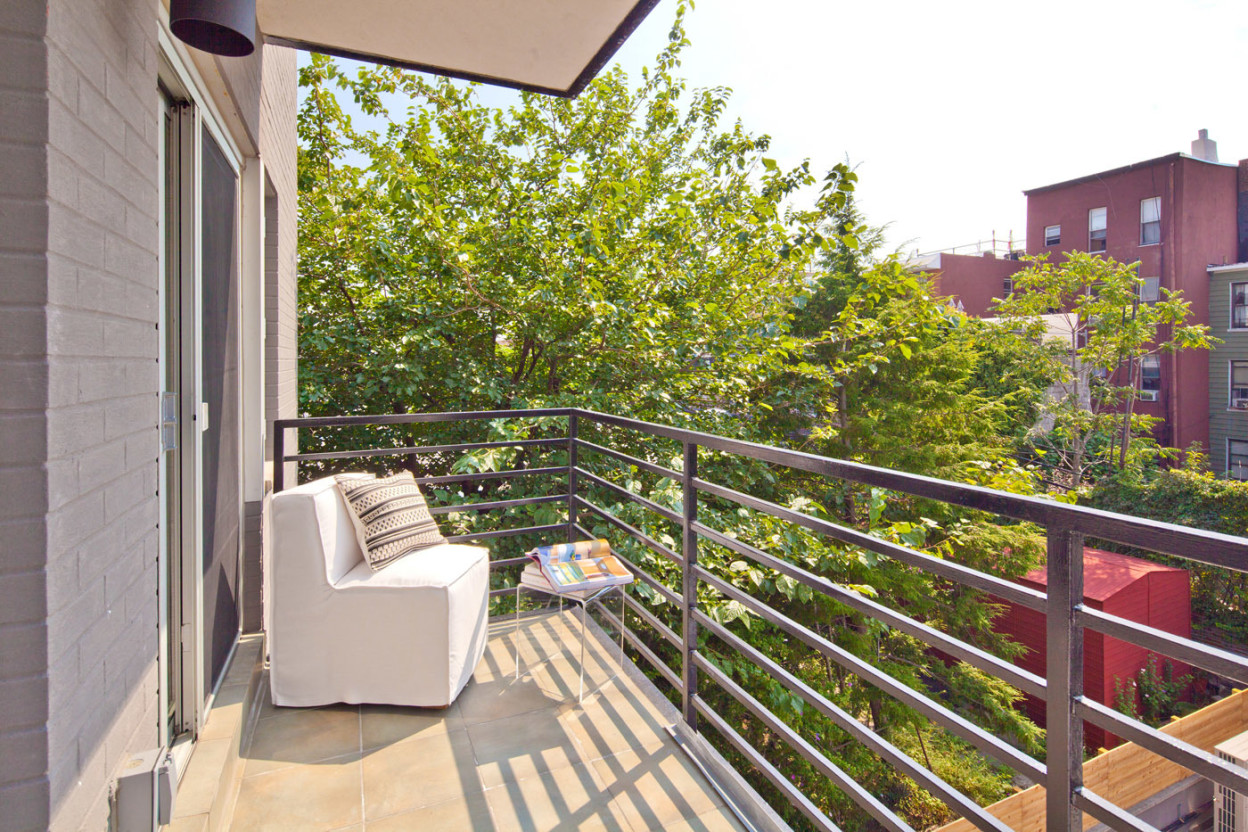 48 Box Street, Unit 5 Brooklyn, NY 11222 - Photo 7 of 10 a view of balcony with furniture