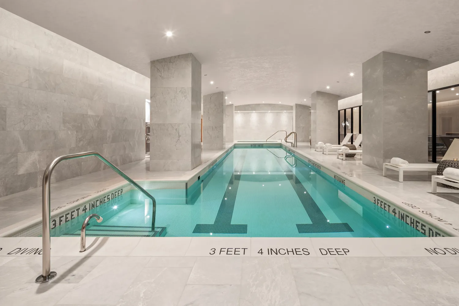 a picture of a room with a sink and mirror