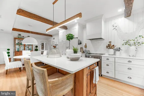 a view of a bedroom with furniture and staircase