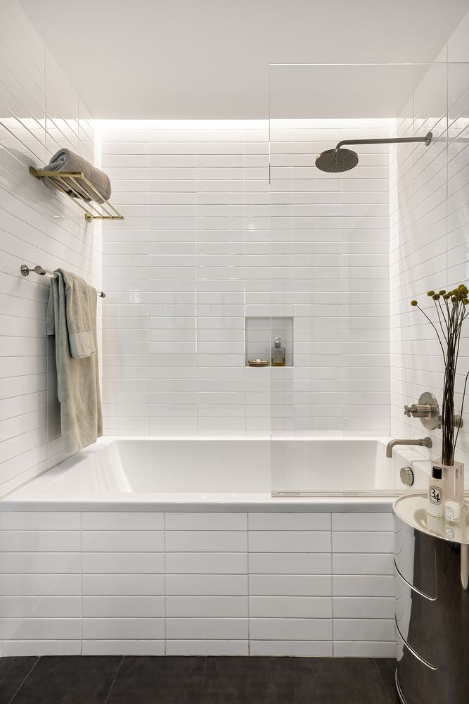280 Metropolitan Avenue, Unit 5D Brooklyn, NY 11211 - Photo 12 of 22 a bathroom with a bathtub and a sink