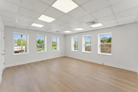 an empty room with windows
