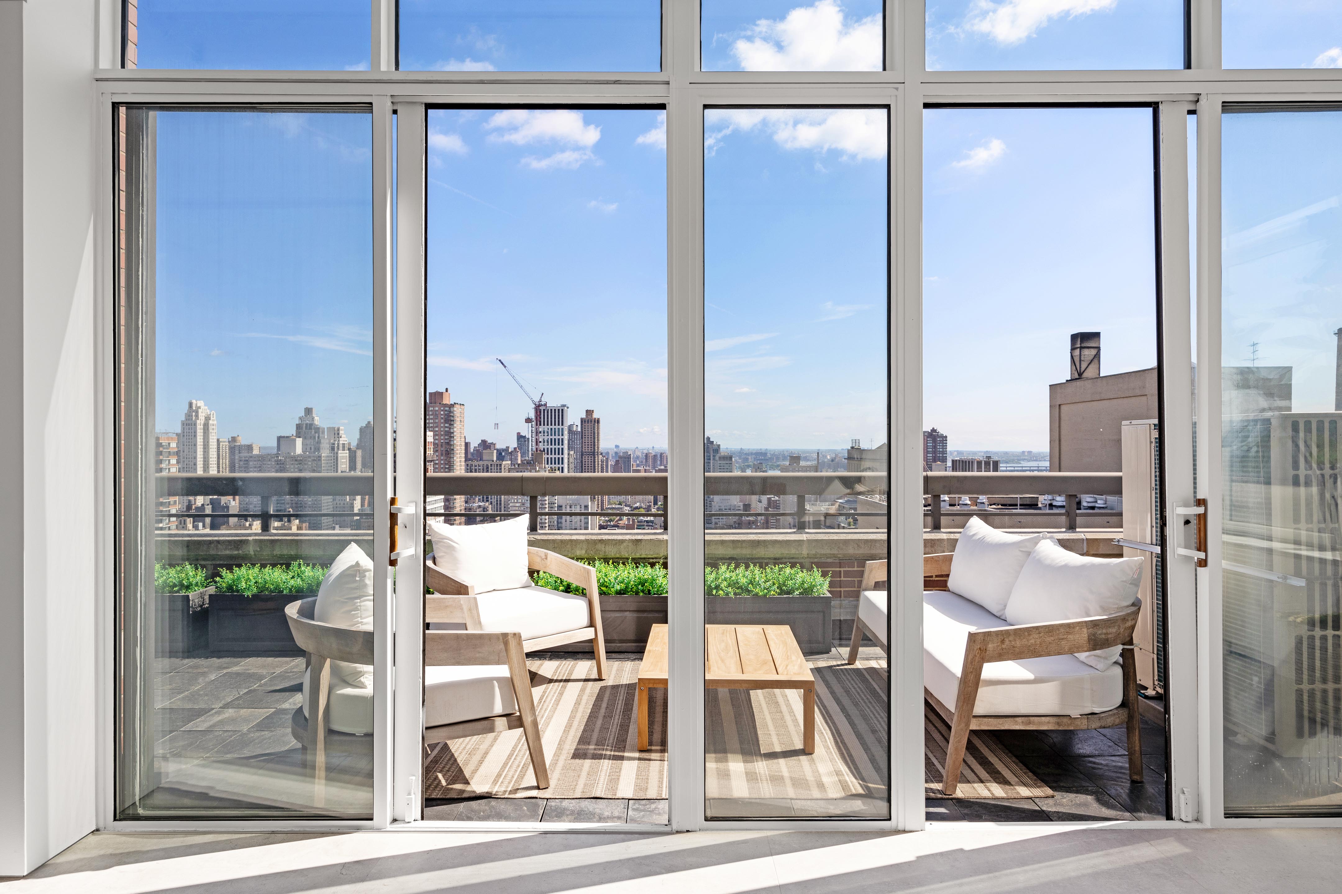422 East 72nd Street, Unit 37AD Manhattan, NY 10021 - Photo 27 of 38 a view of a balcony with city view