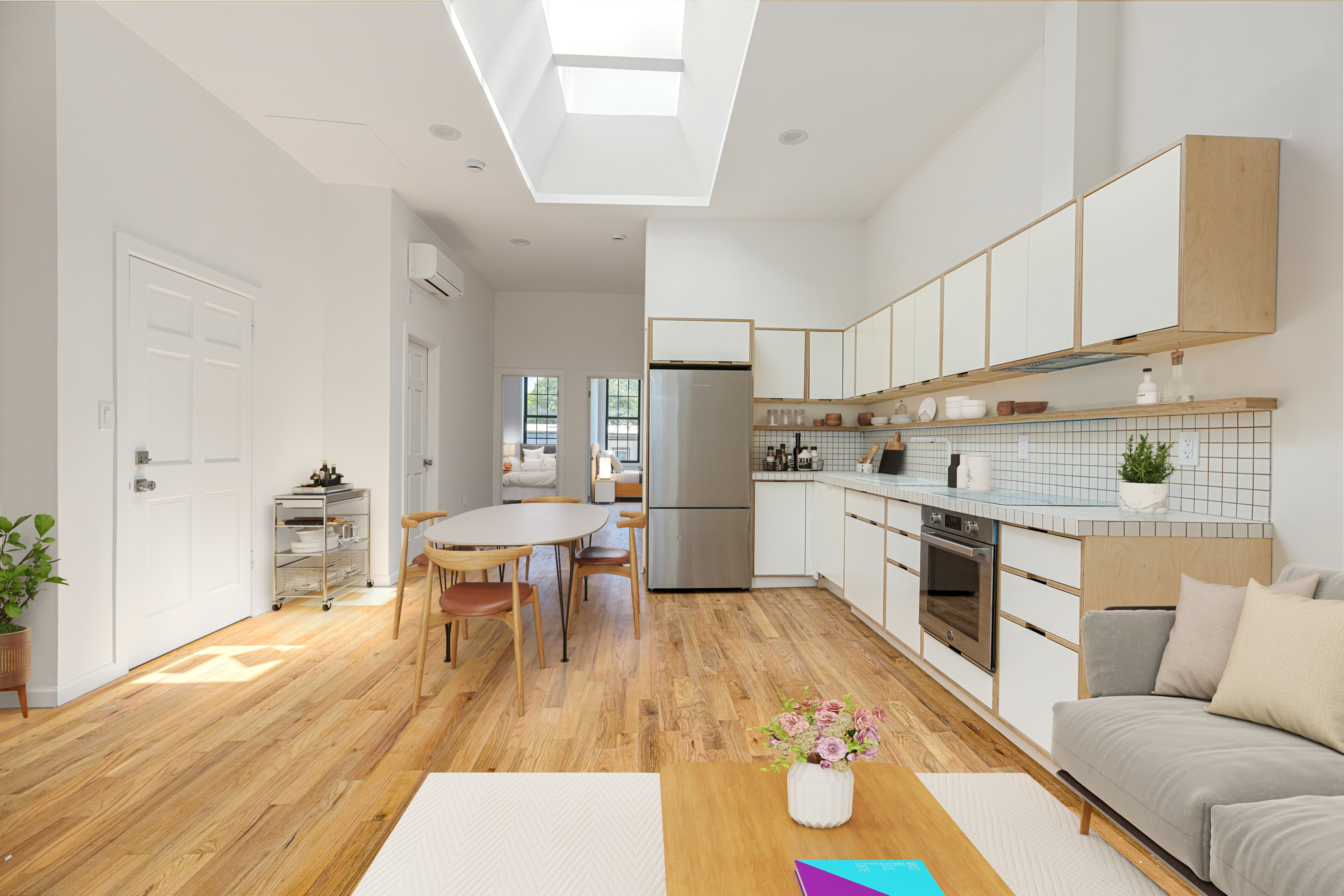 a kitchen with a table chairs a sink dishwasher stove and cabinets with wooden floor