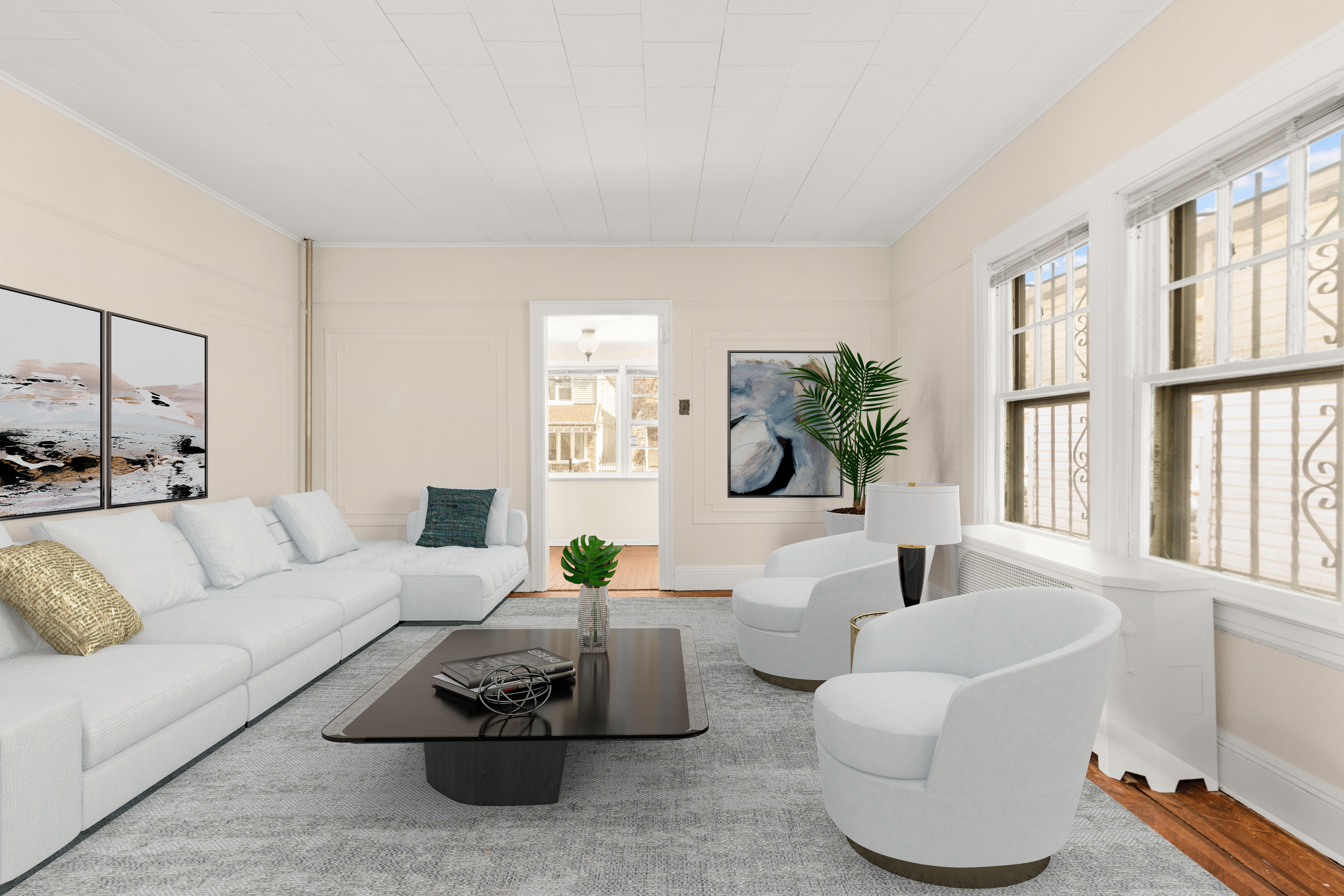 107-28 118th Street Queens, NY 11419 - Photo 3 of 12 a living room with furniture and a potted plant