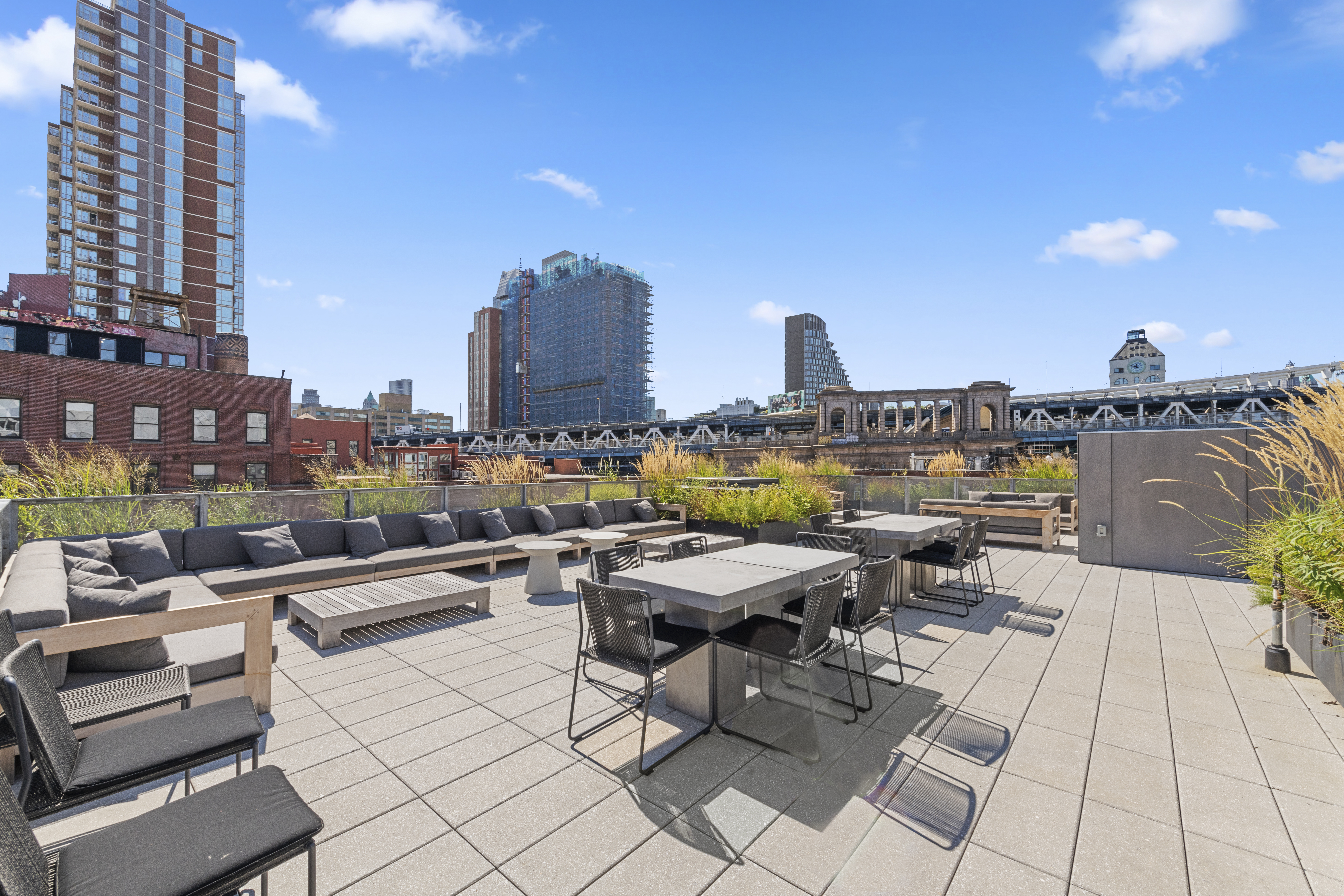 168 Plymouth Street, Unit 5A Brooklyn, NY 11201 - Photo 14 of 19 a view of roof deck with outdoor seating and city view