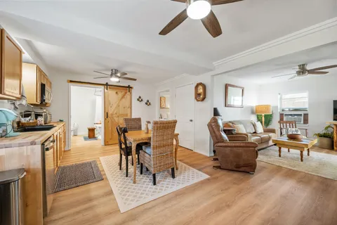 a view of a dining room with furniture
