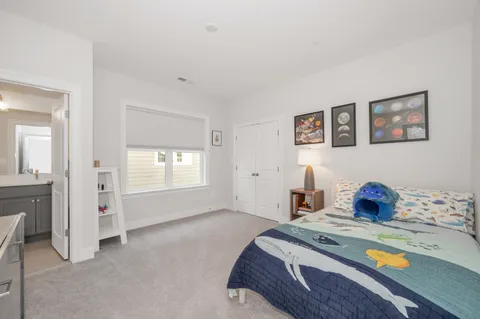 a view of house with swimming pool and porch