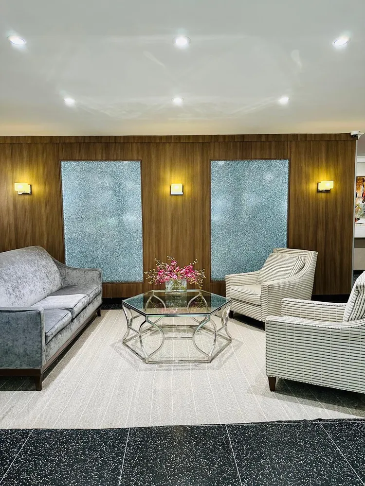 a living room with furniture and window