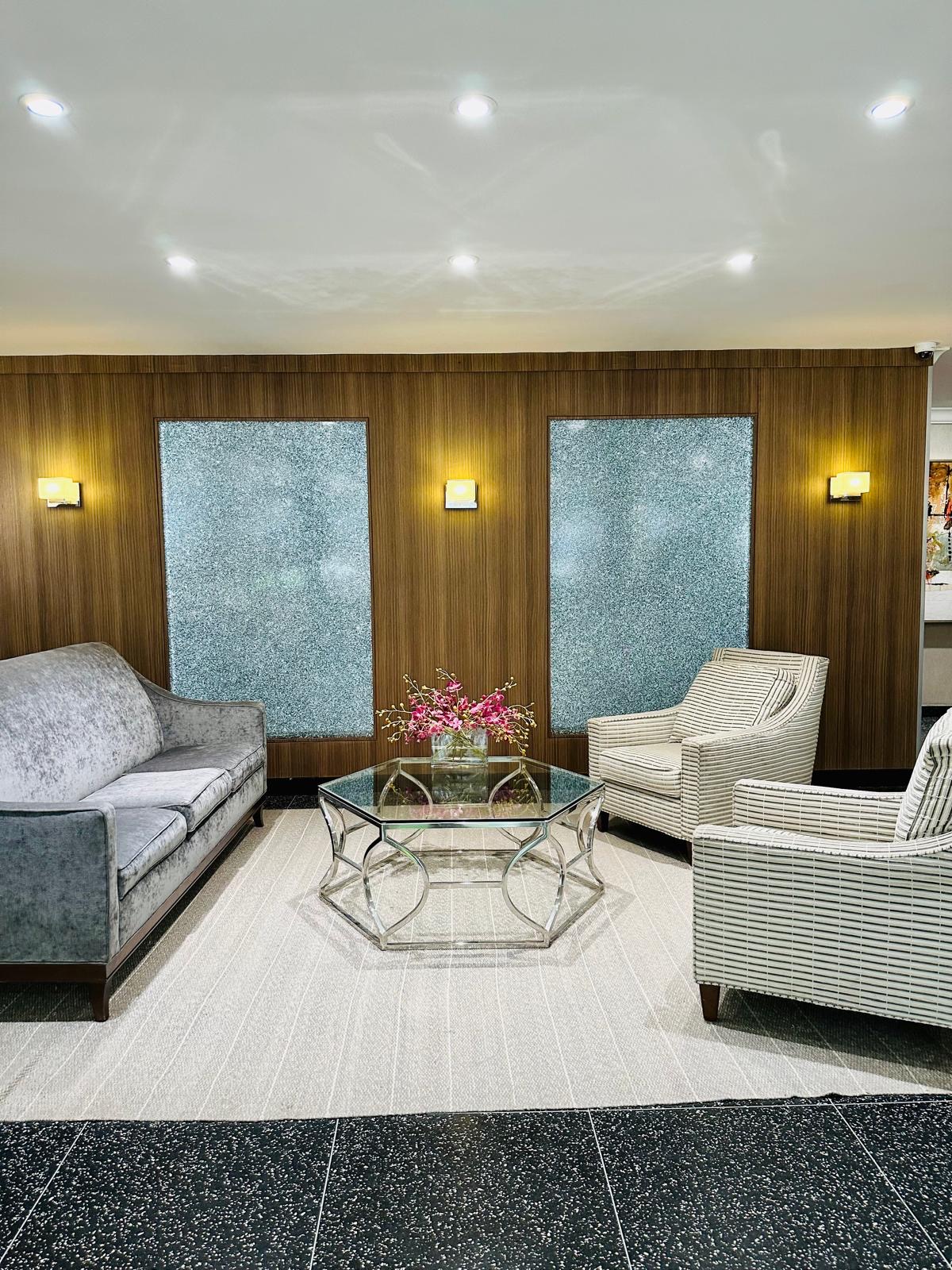 309 East 87th Street, Unit 3L Manhattan, NY 10128 - Photo 13 of 14 a living room with furniture and window