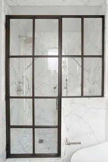 a living room with a glass window