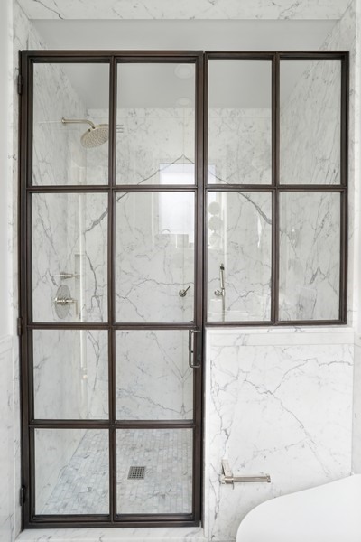 350 East 57th Street, Unit 14B Manhattan, NY 10022 - Photo 10 of 14 a living room with a glass window