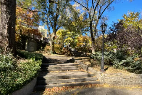 a view of street along with trees