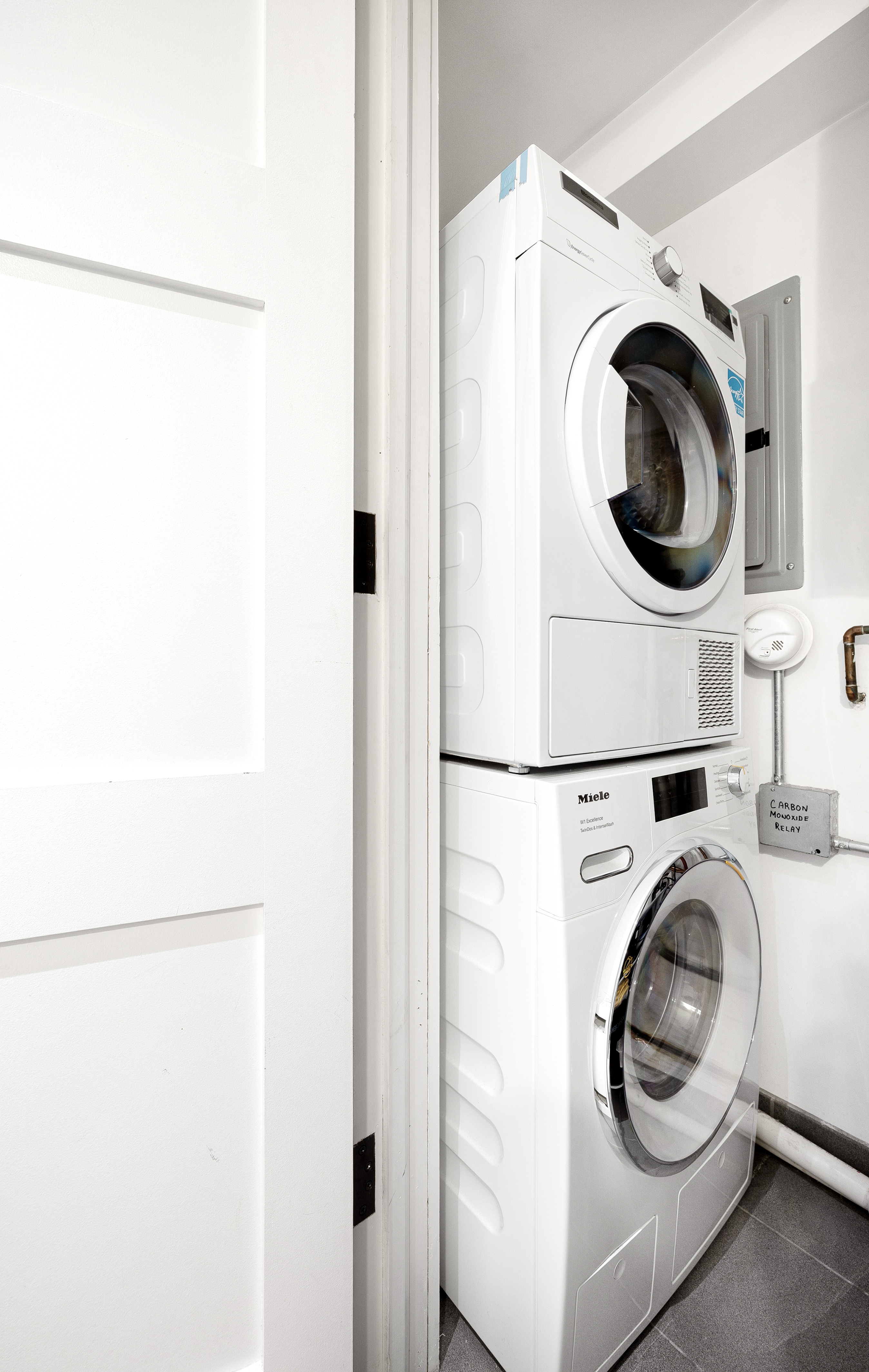 174 Jackson Street, Unit 2A Brooklyn, NY 11211 - Photo 11 of 17 a utility room with dryer and washer