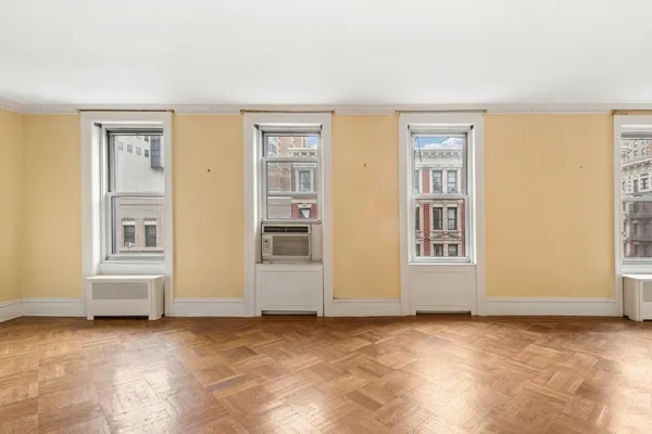a view of an empty room with a window