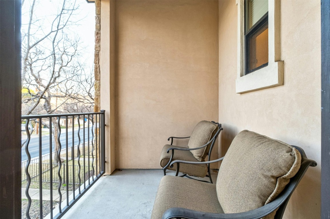 2505 Enfield Road, Unit 4 Austin, TX 78703 - Photo 8 of 19 a view of balcony with wooden floor