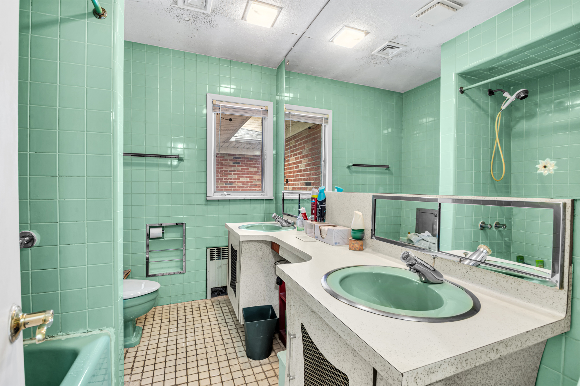 2 Livingston Court Staten Island, NY 10310 - Photo 7 of 14 a bathroom with a sink a toilet and mirror