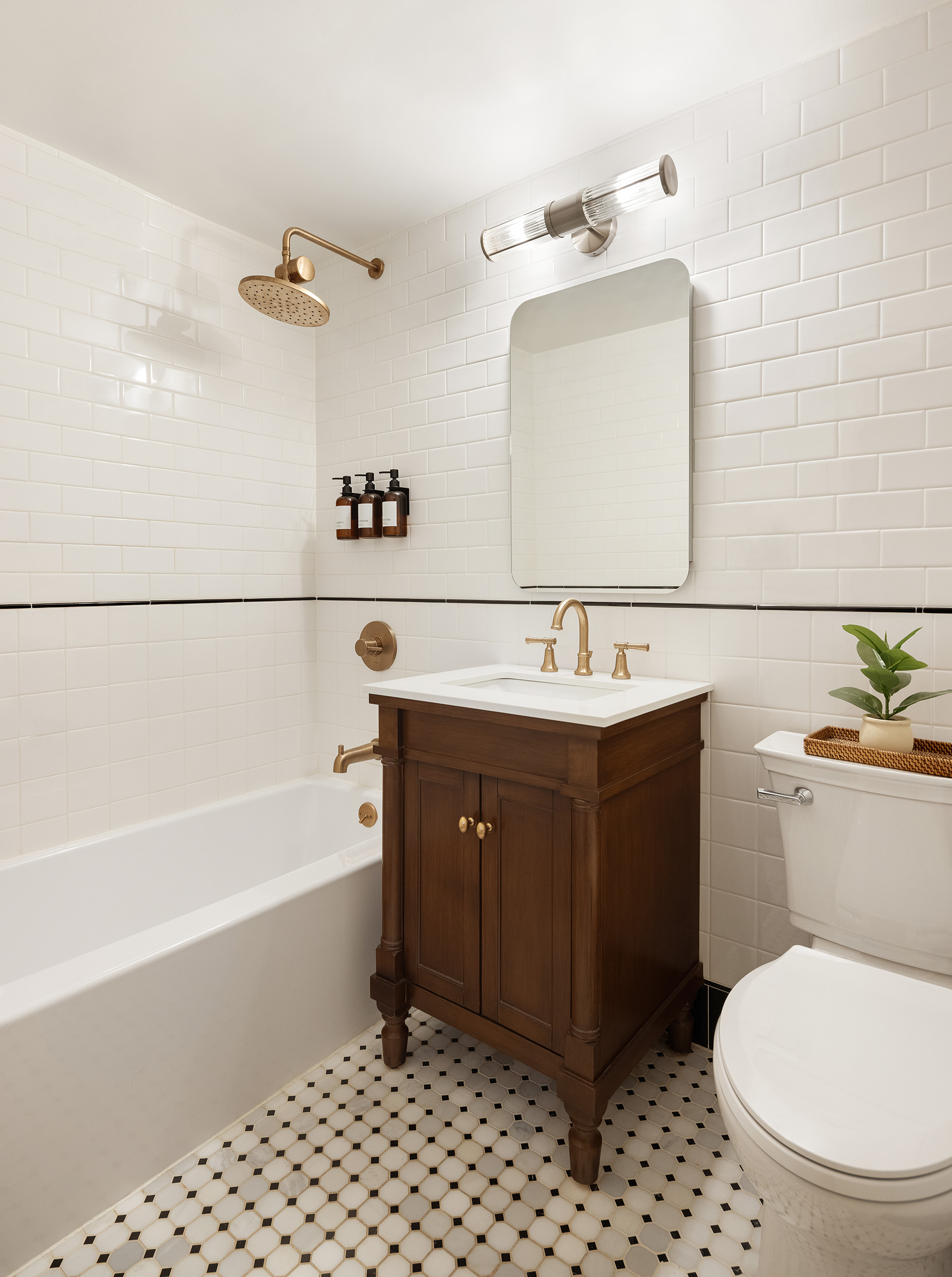201 Clinton Avenue, Unit 1G Brooklyn, NY 11205 - Photo 8 of 9 a bathroom with a sink vanity mirror and toilet