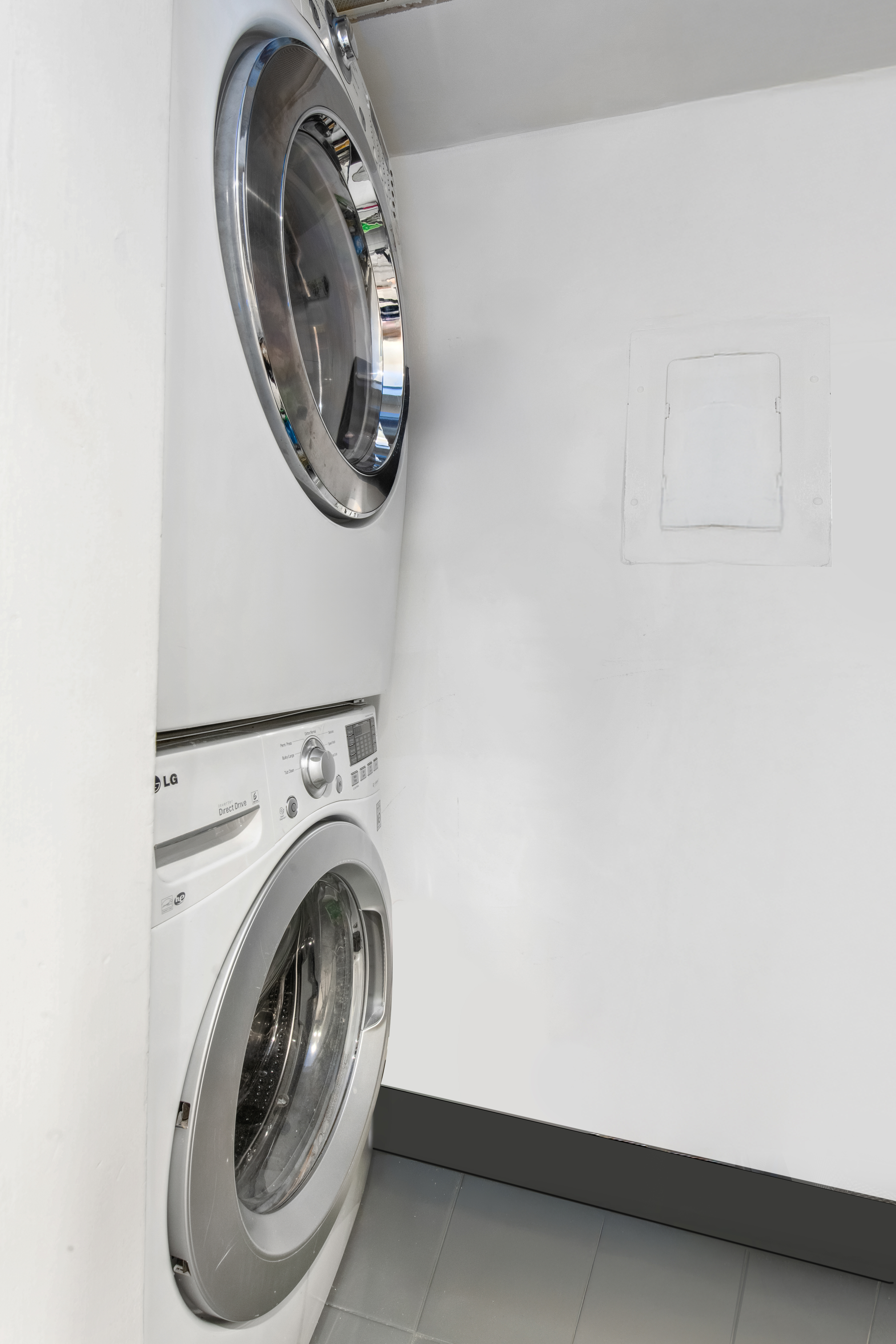 112 West 18th Street, Unit 2A Manhattan, NY 10011 - Photo 10 of 10 a utility room with dryer and washer