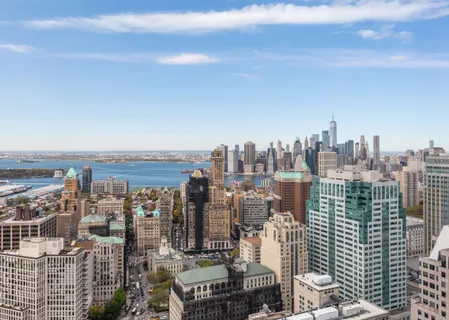 a view of a city with tall buildings