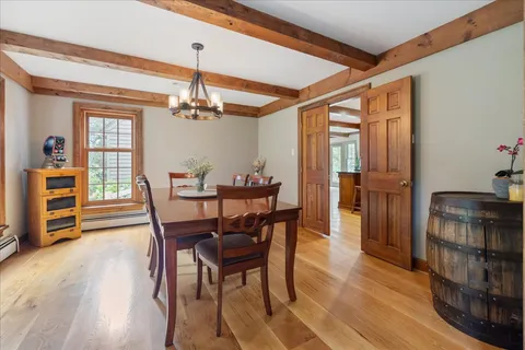 a spacious bedroom with a large bed and a large window