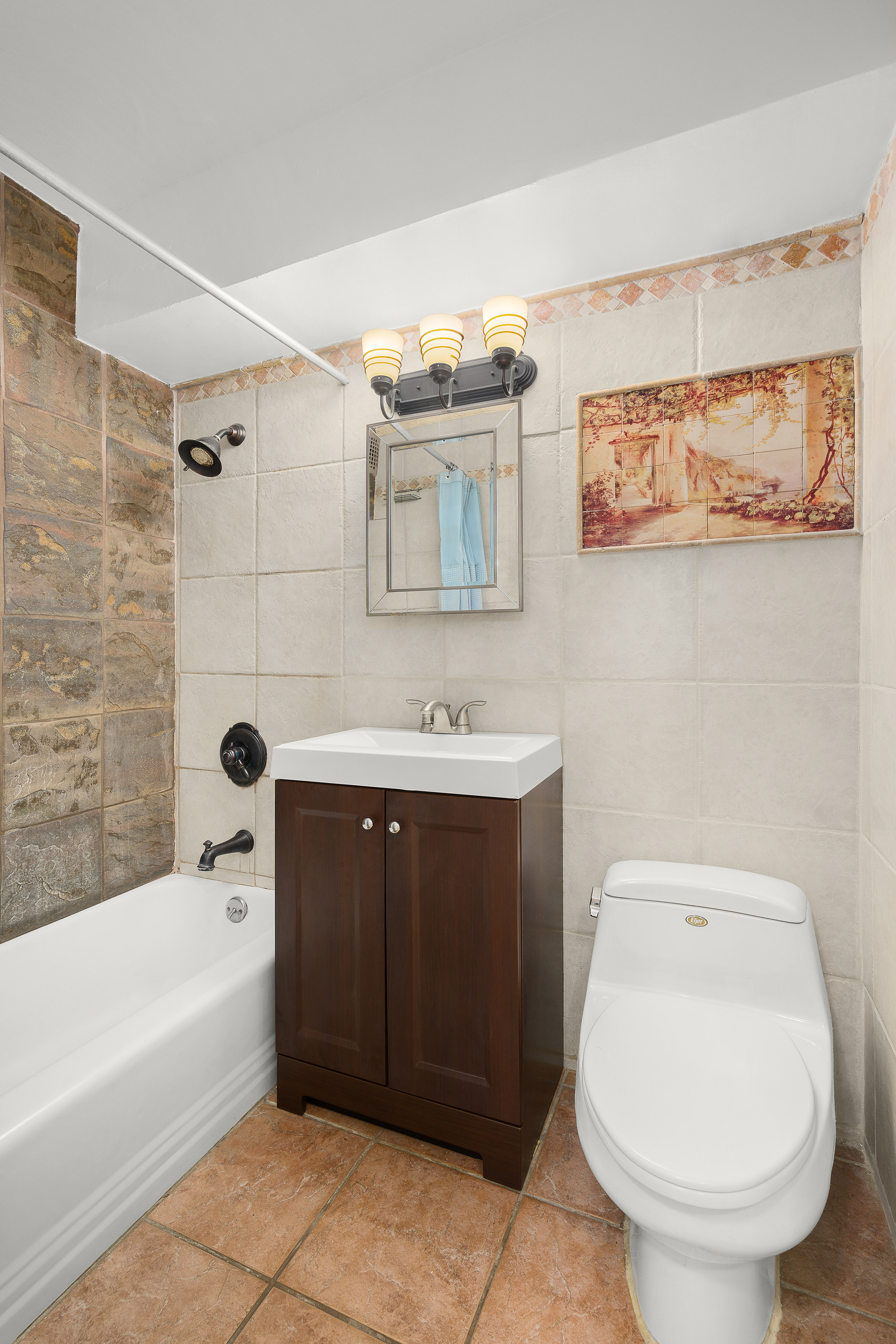 200 East 27th Street, Unit 11H Manhattan, NY 10016 - Photo 3 of 9 a bathroom with a sink toilet and bathtub