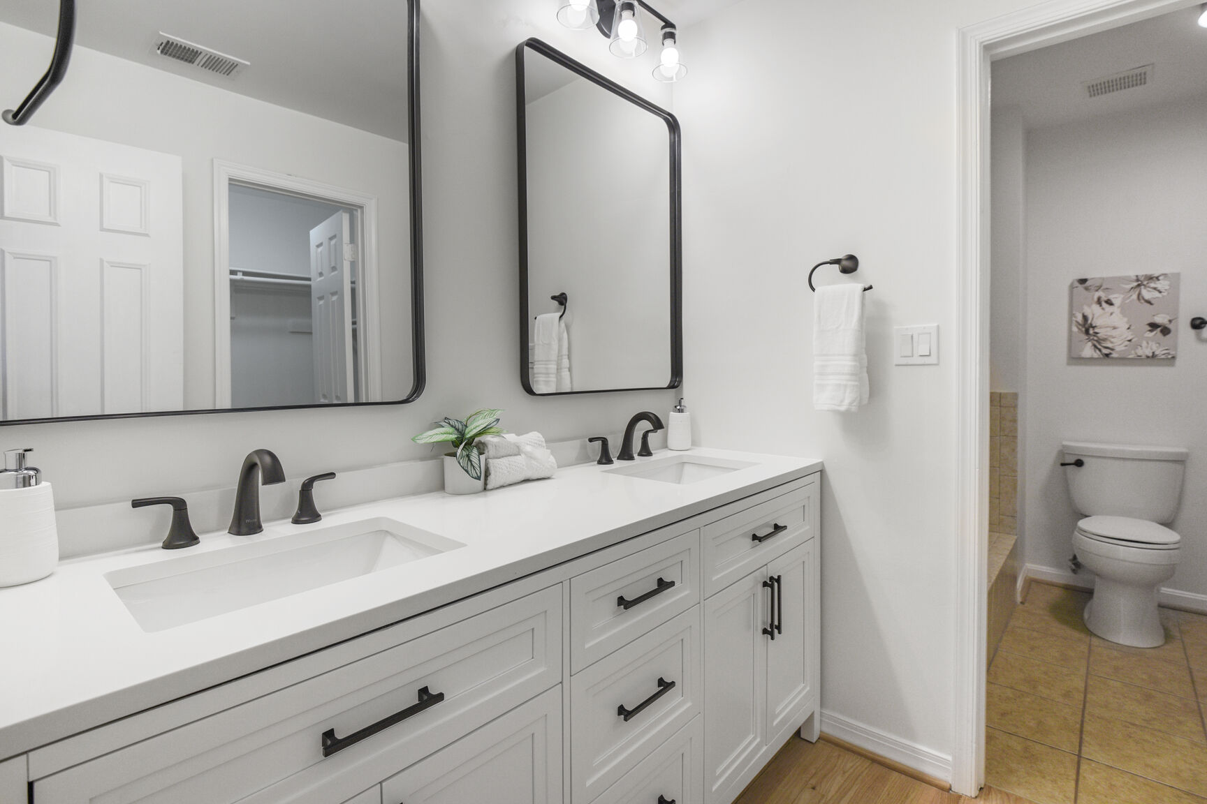 4008 Evangeline Terrace Olney, MD 20832 - Photo 29 of 54 a bathroom with double sink and a mirror