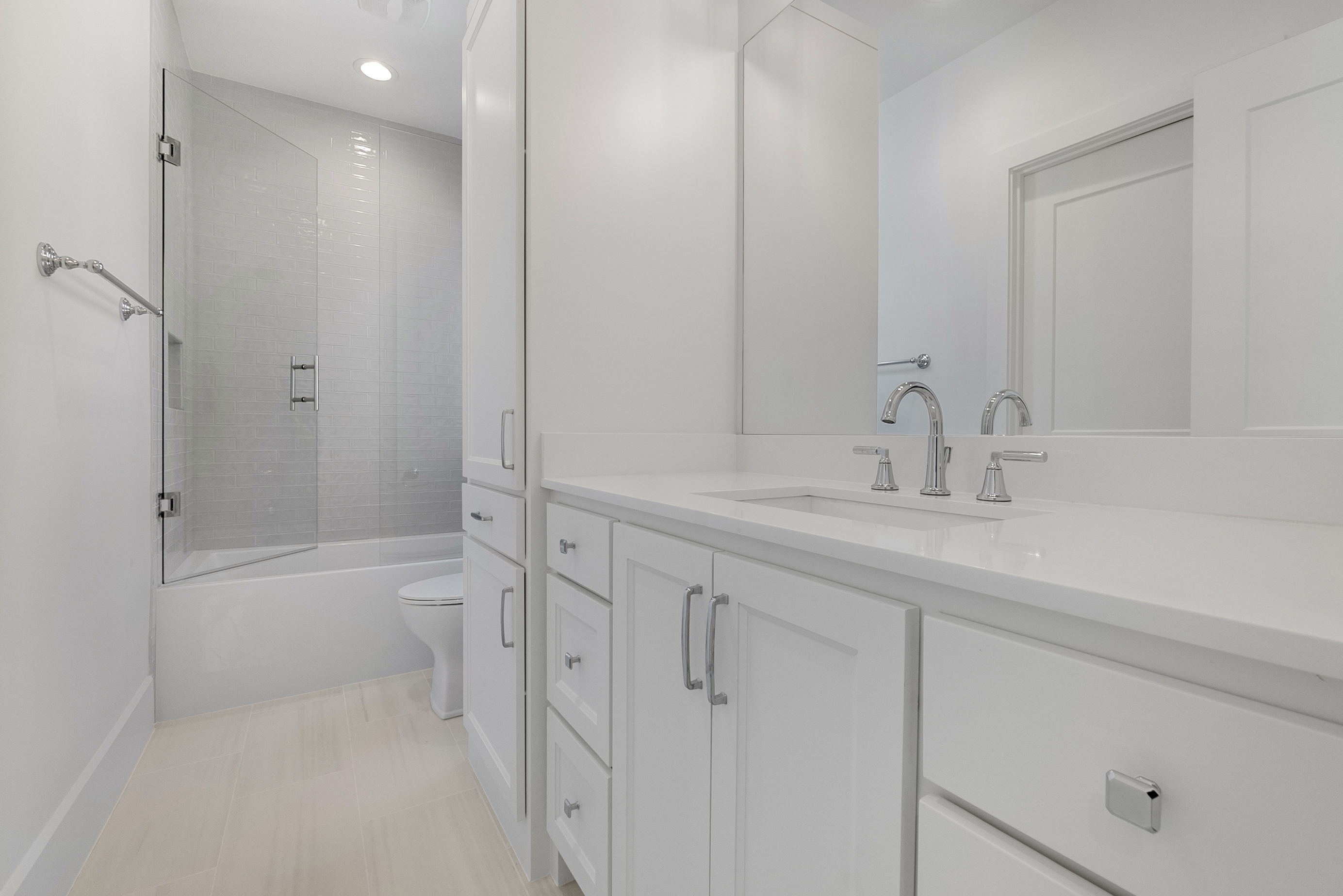 4410 Glenwick Lane Dallas, TX 75205 - Photo 22 of 28 a bathroom with a sink a toilet and shower
