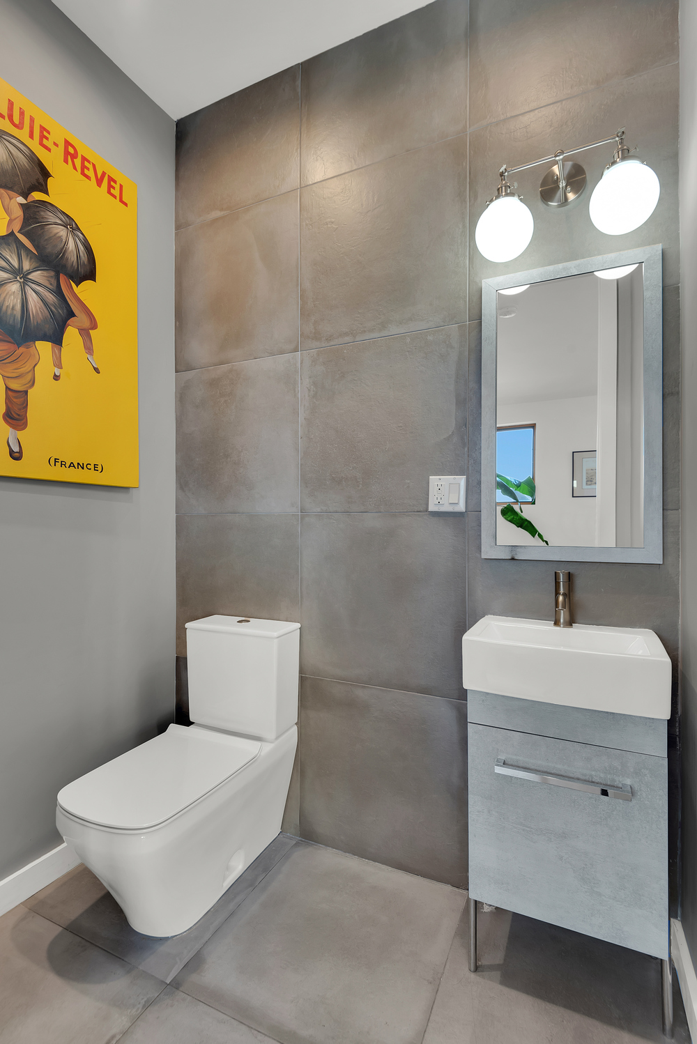 267 Evergreen Avenue, Unit PH Brooklyn, NY 11221 - Photo 14 of 19 a bathroom with a sink mirror and toilet