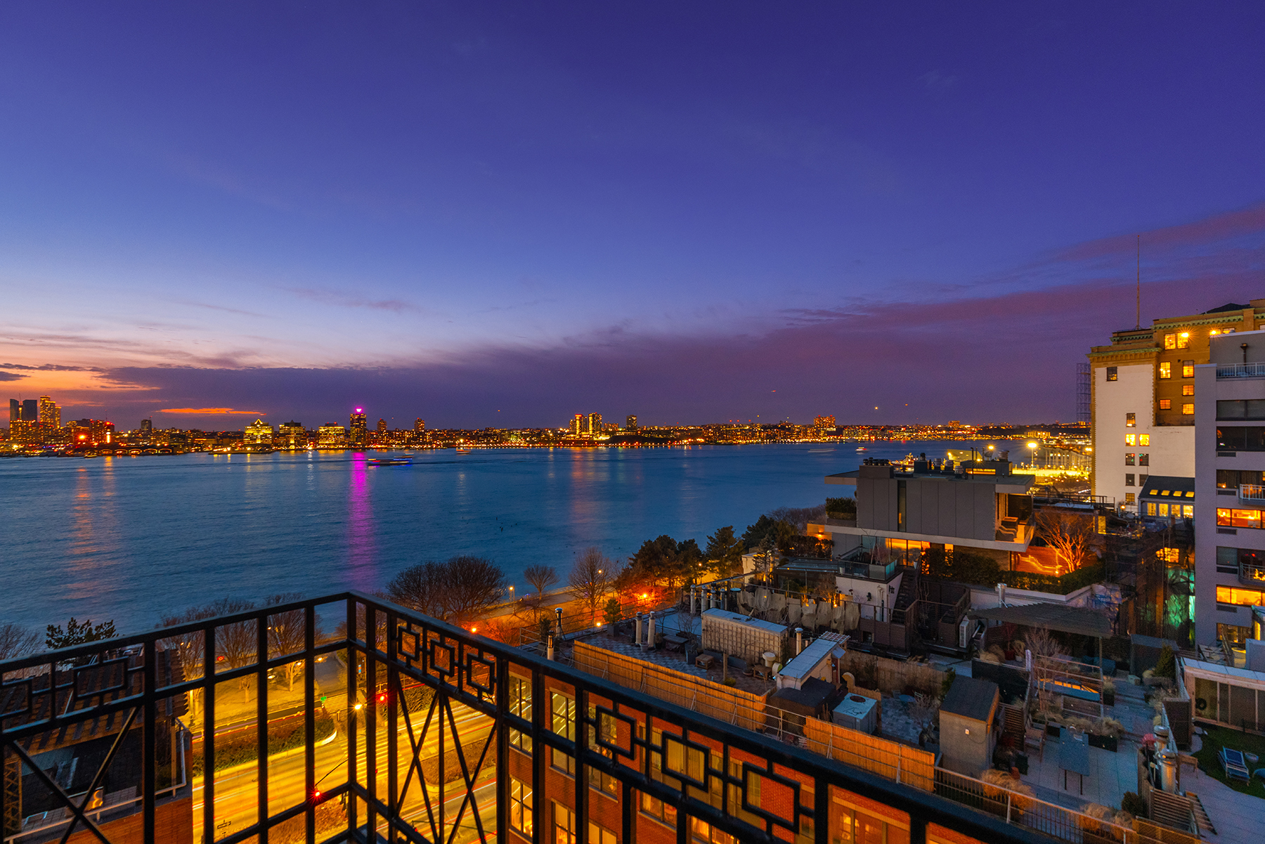 366 West 11th Street, Unit PHF Manhattan, NY 10014 - Photo 27 of 28 a view of a lake with a city skyline in the background
