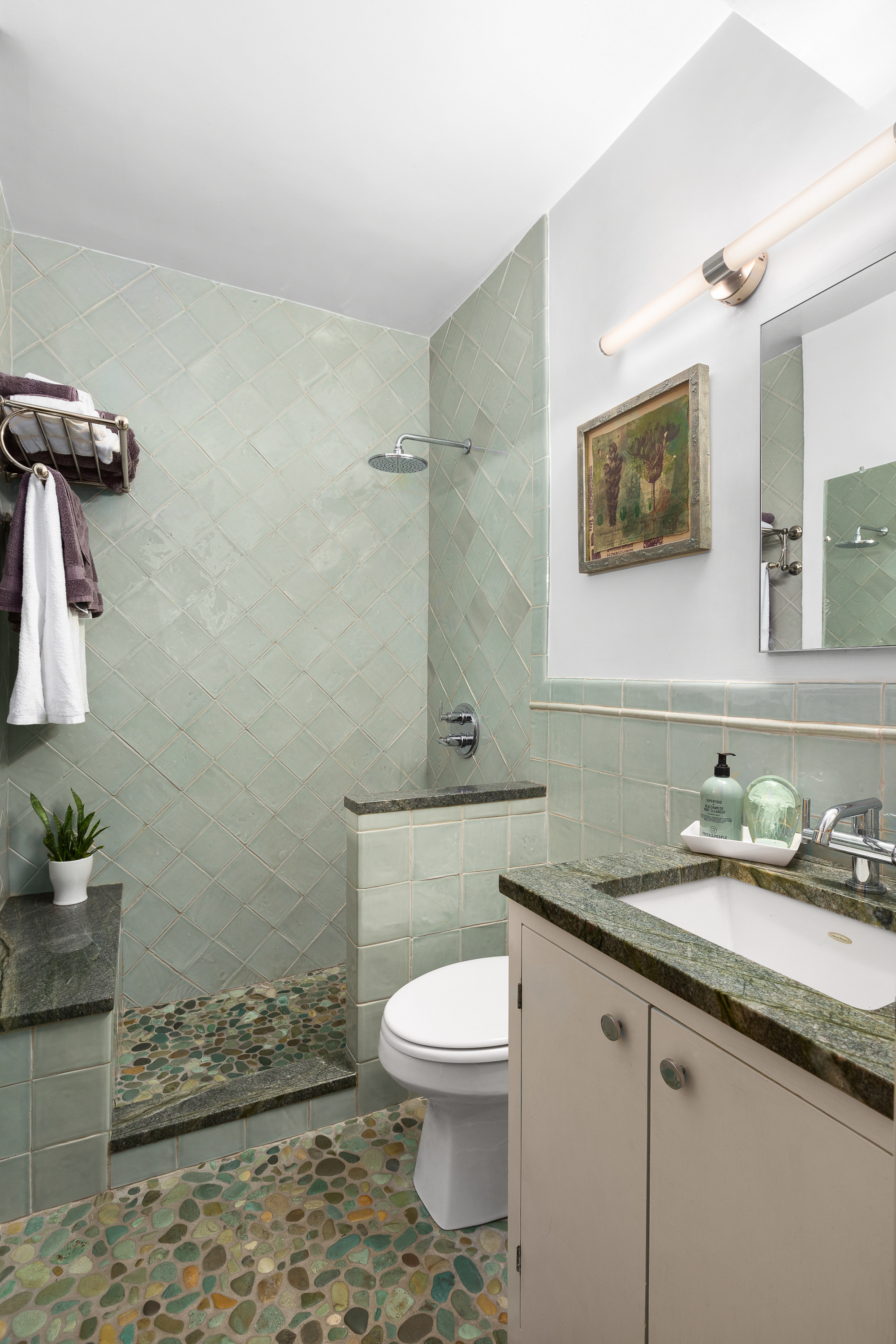 230 Central Park West, Unit 14I Manhattan, NY 10024 - Photo 9 of 17 a bathroom with a granite countertop sink a toilet and a mirror
