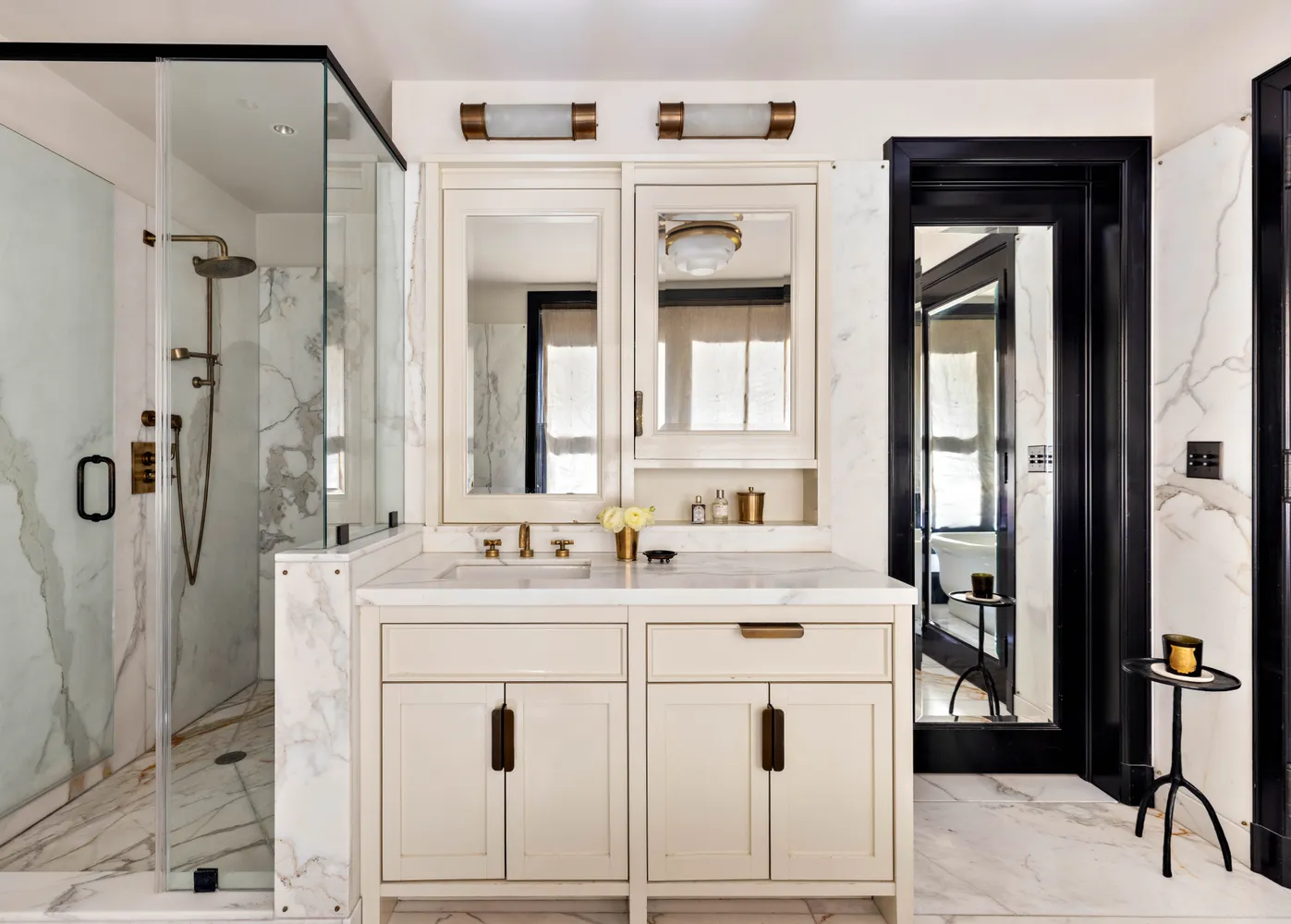 a bathroom with a sink vanity and a mirror