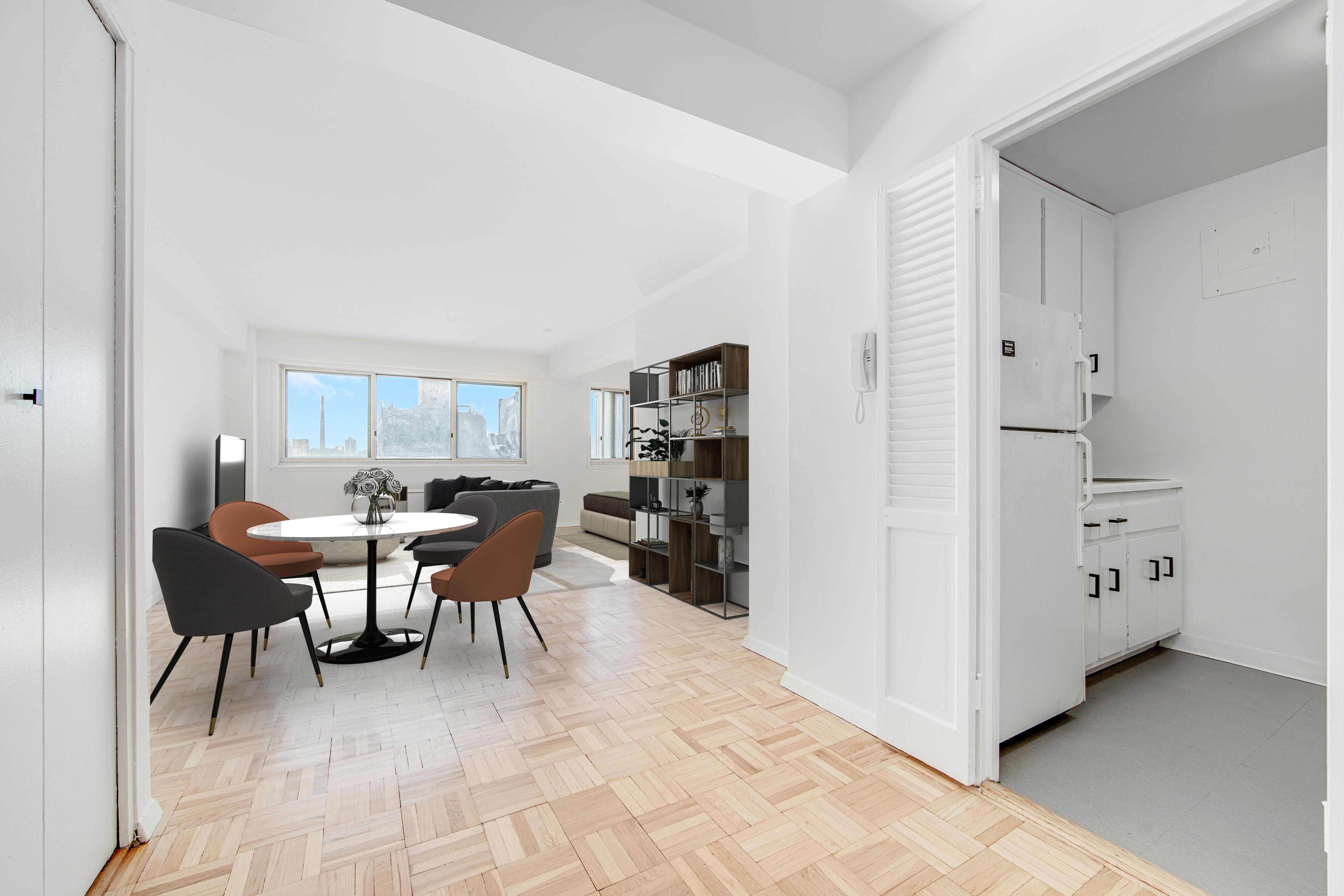 401 East 65th Street, Unit 10H Manhattan, NY 10065 - Photo 5 of 14 a dining room with furniture and window