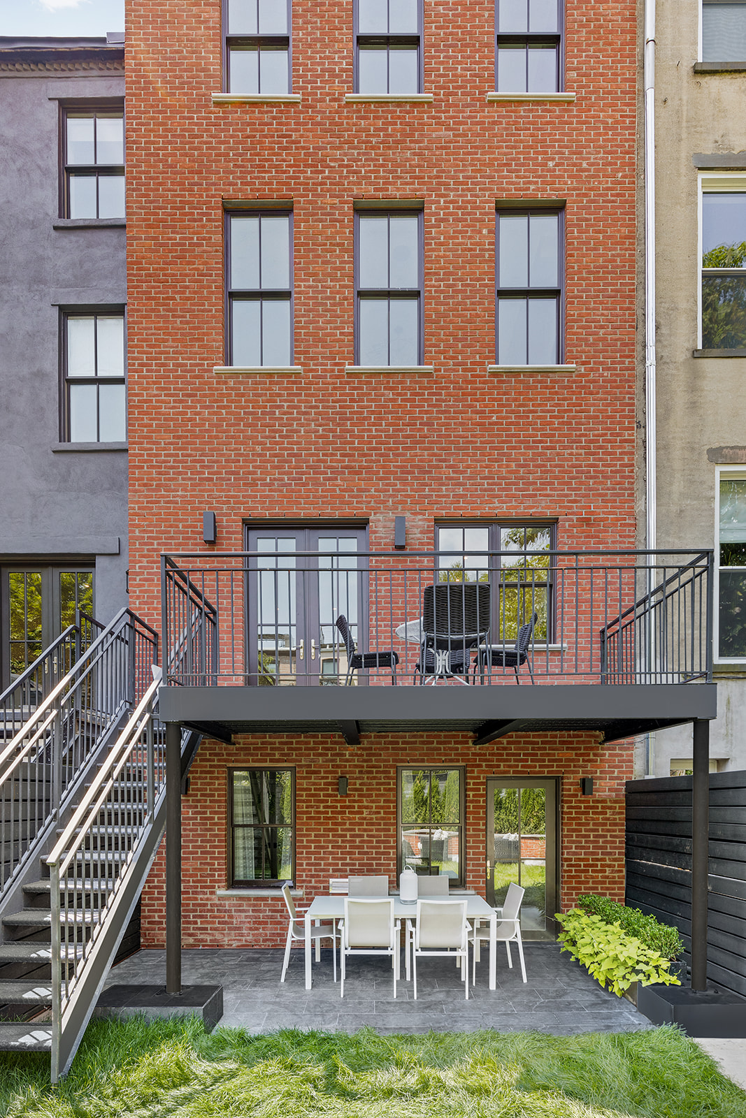 281 Jefferson Avenue Brooklyn, NY 11216 - Photo 8 of 25 a view of a house with pool and chairs