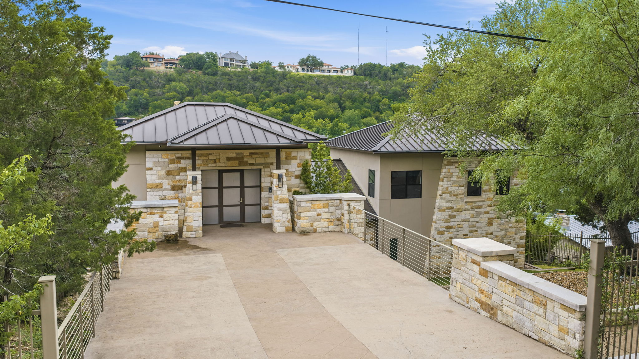 3605 Robbins Road Austin, TX 78730 - Photo 41 of 51 a front view of a house with yard and sitting area